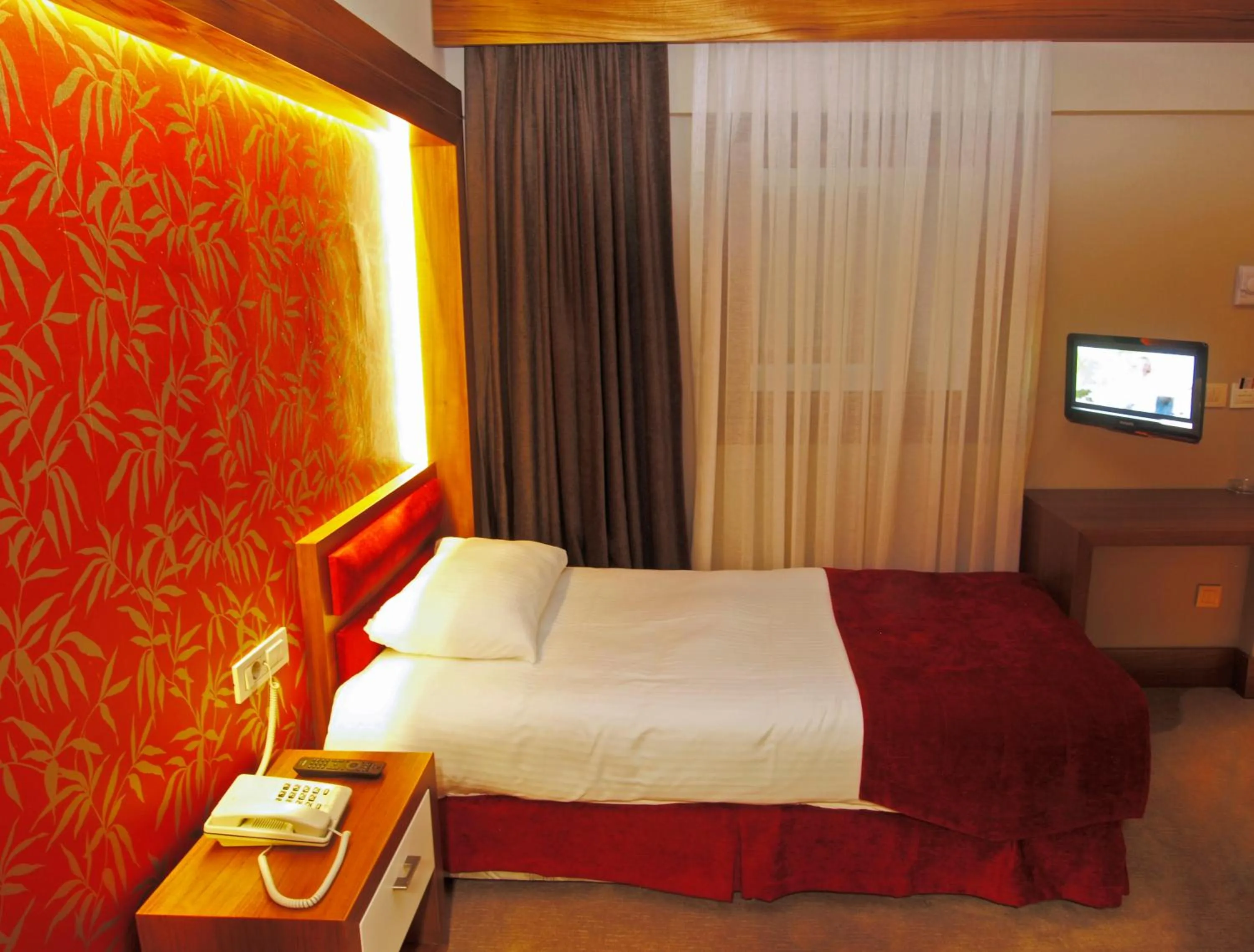 Photo of the whole room, Bed in Bella Hotel