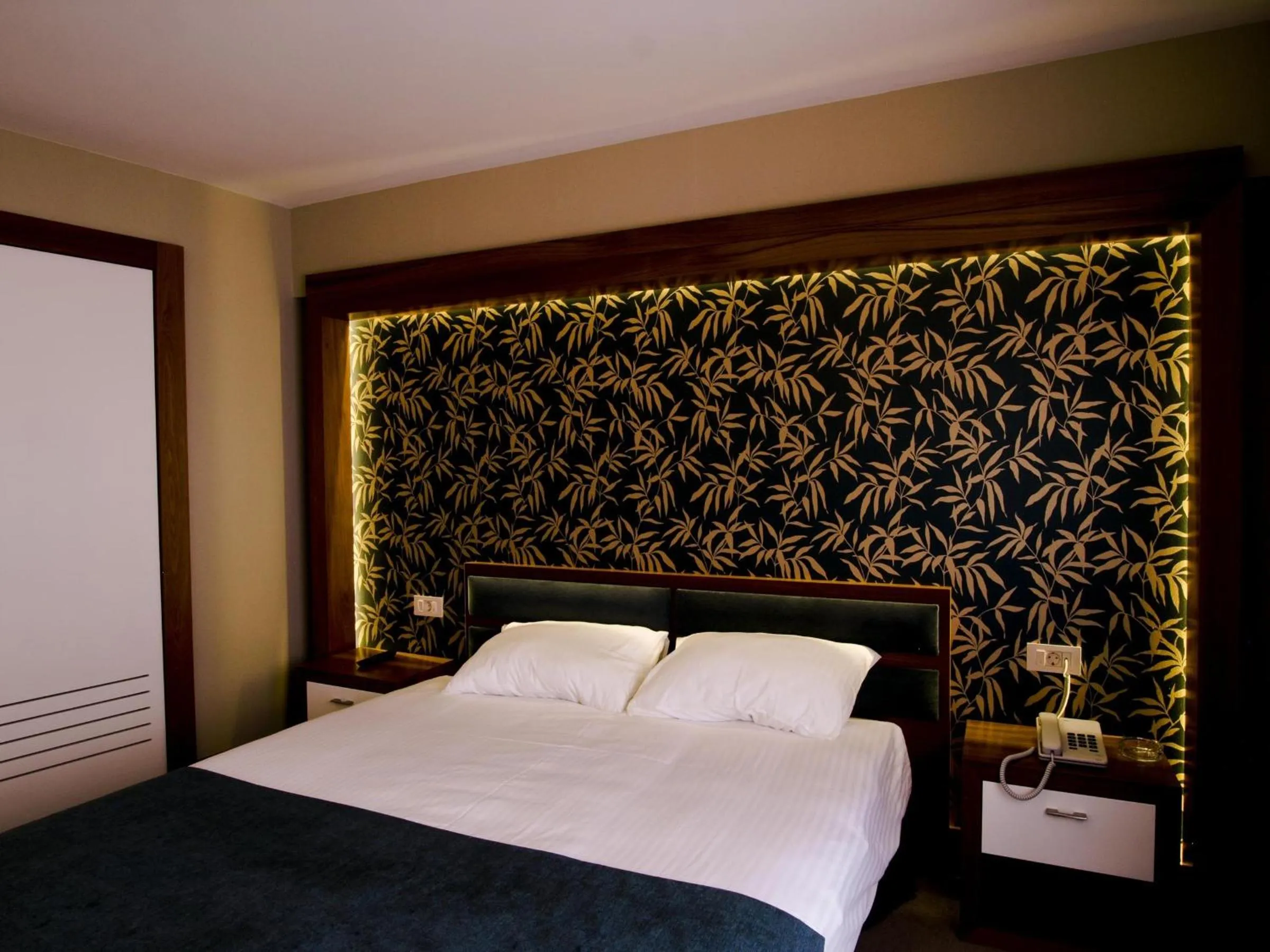 Photo of the whole room, Bed in Bella Hotel