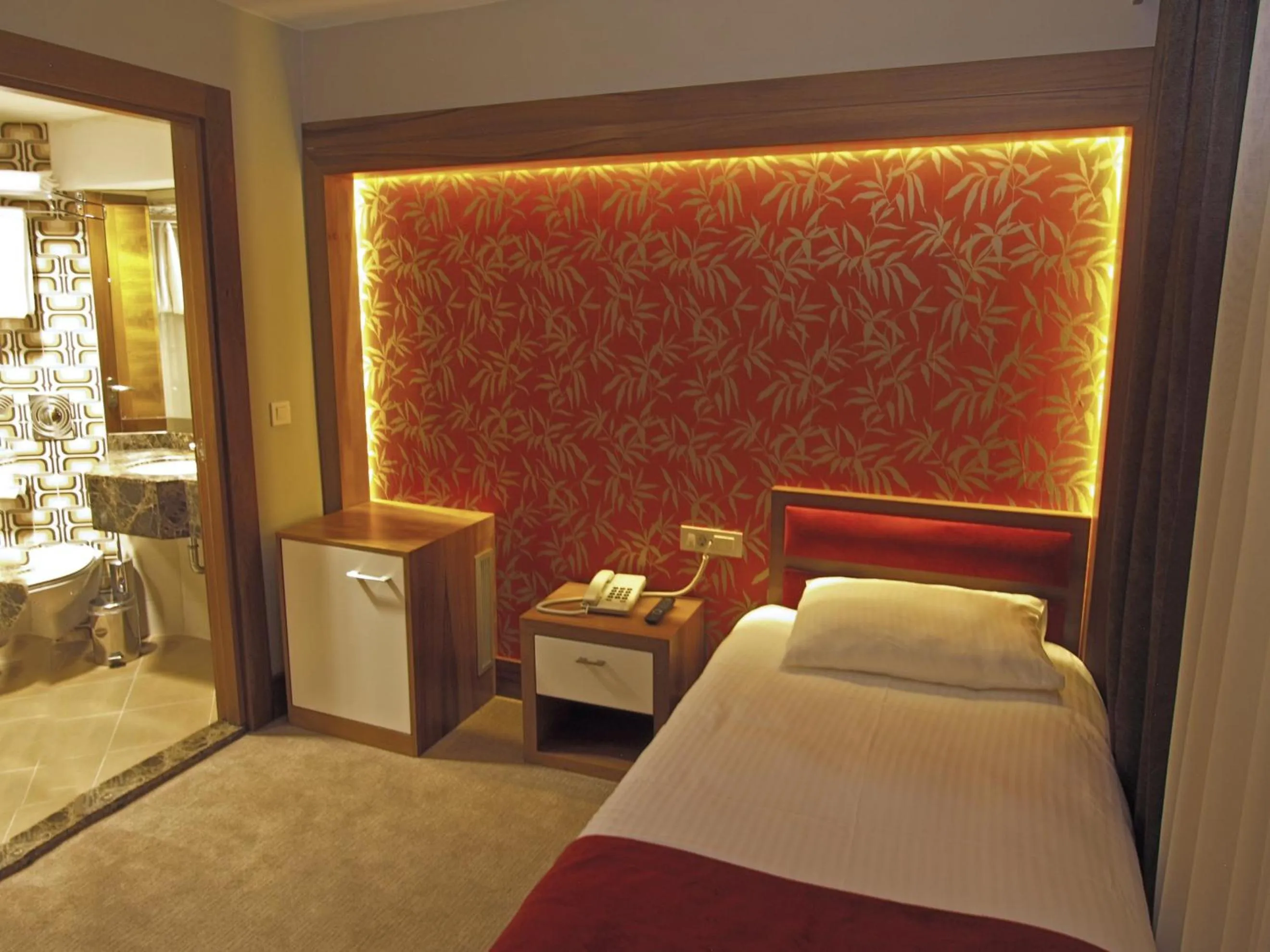 Photo of the whole room, Bed in Bella Hotel