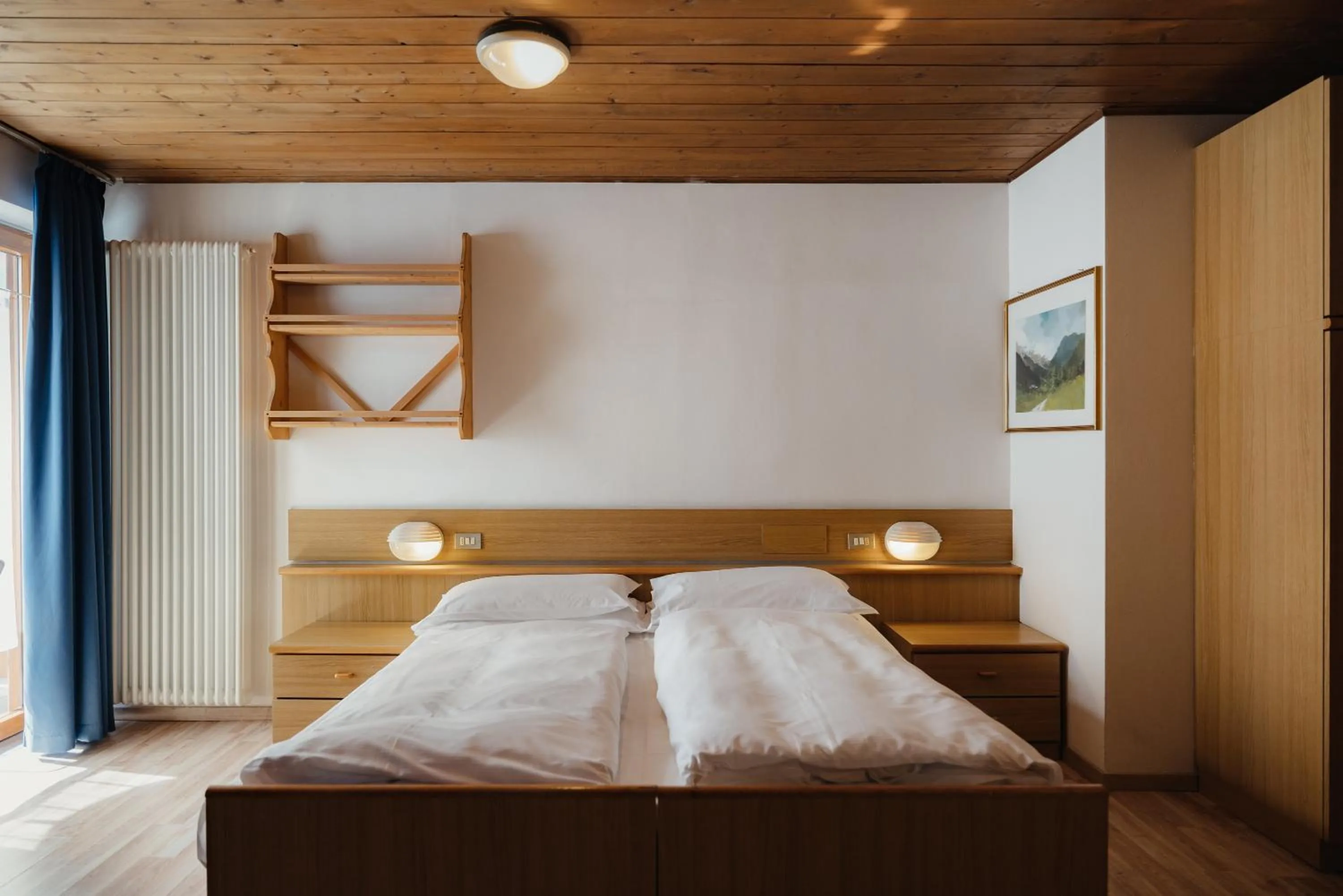 Photo of the whole room, Bed in Hotel La Montanara Predazzo