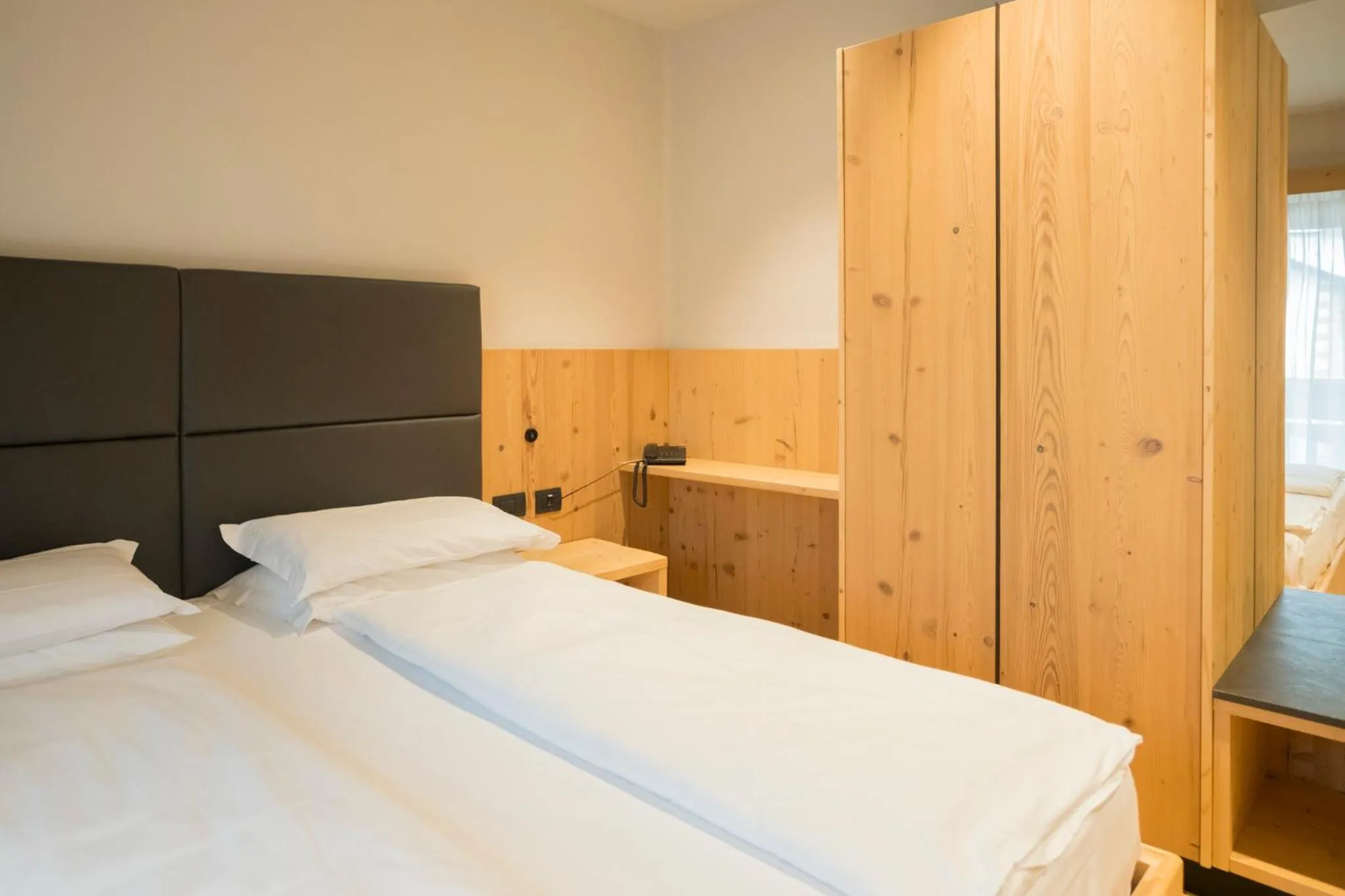 Bed in Hotel La Montanara Predazzo