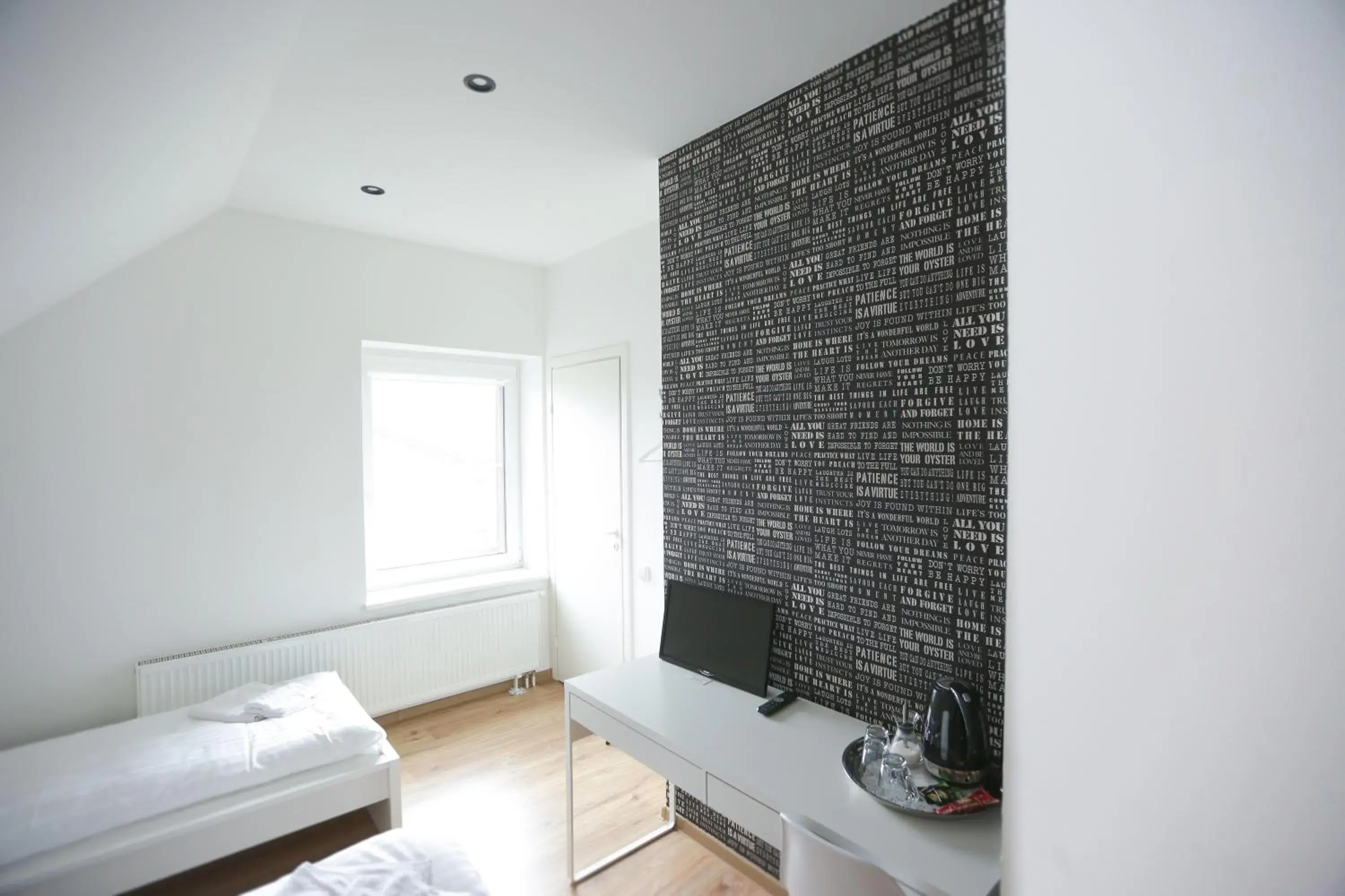 Comfort Triple Room with Shower in B&B Hotel Telsiai Comfort Triple Room with Shower in B&B Hotel Telsiai