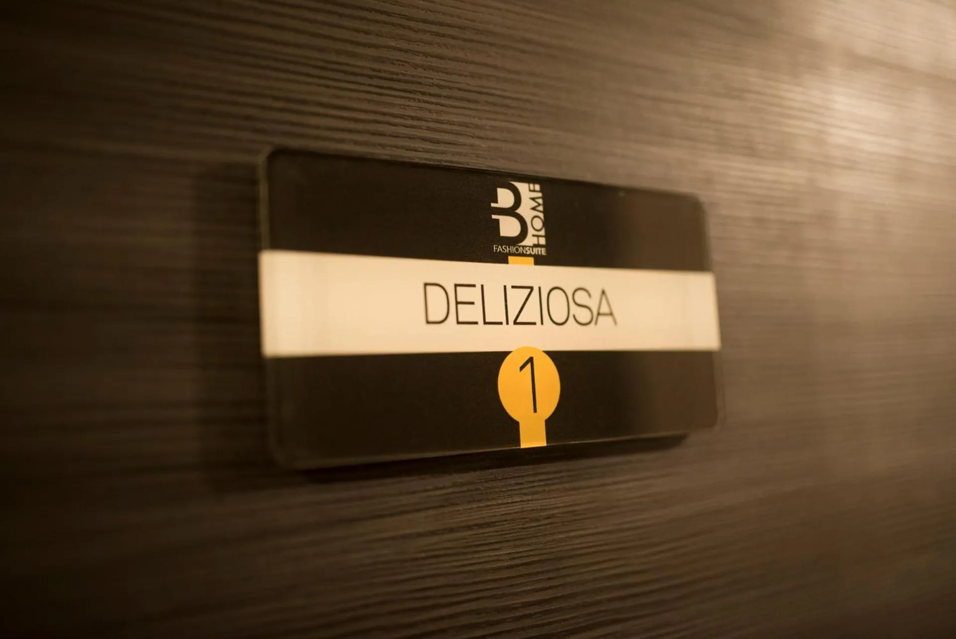 Property logo or sign in BHome Fashion Suite