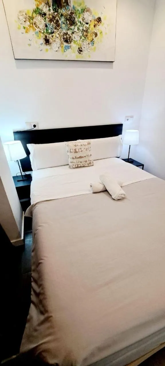 Bed in AYZ Ulises - Auto check-in property