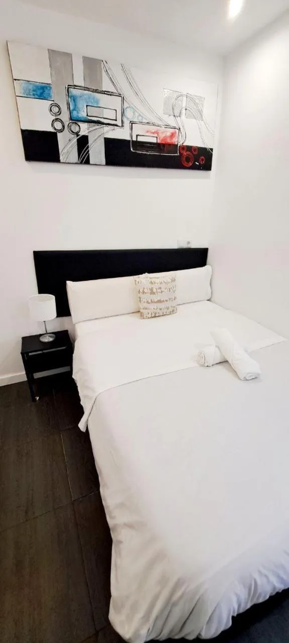 Bed in AYZ Ulises - Auto check-in property