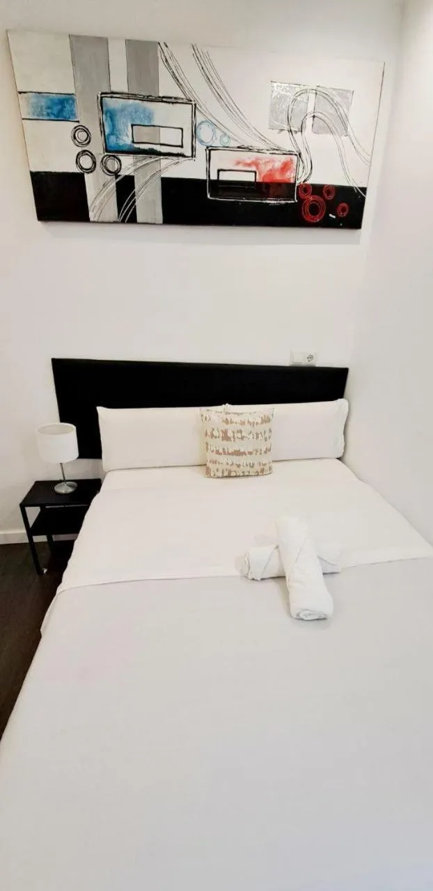 Bed in AYZ Ulises - Auto check-in property