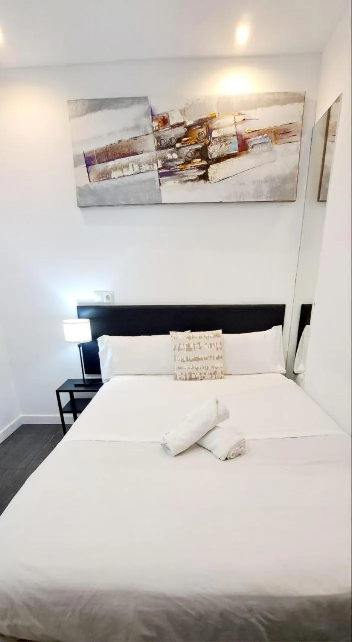 Bed in AYZ Ulises - Auto check-in property