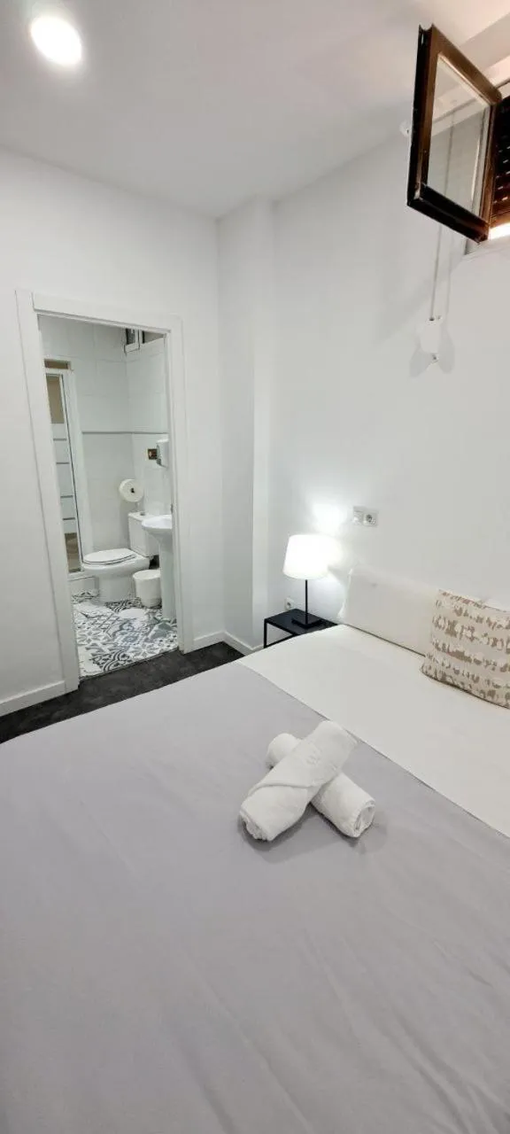 Bed in AYZ Ulises - Auto check-in property
