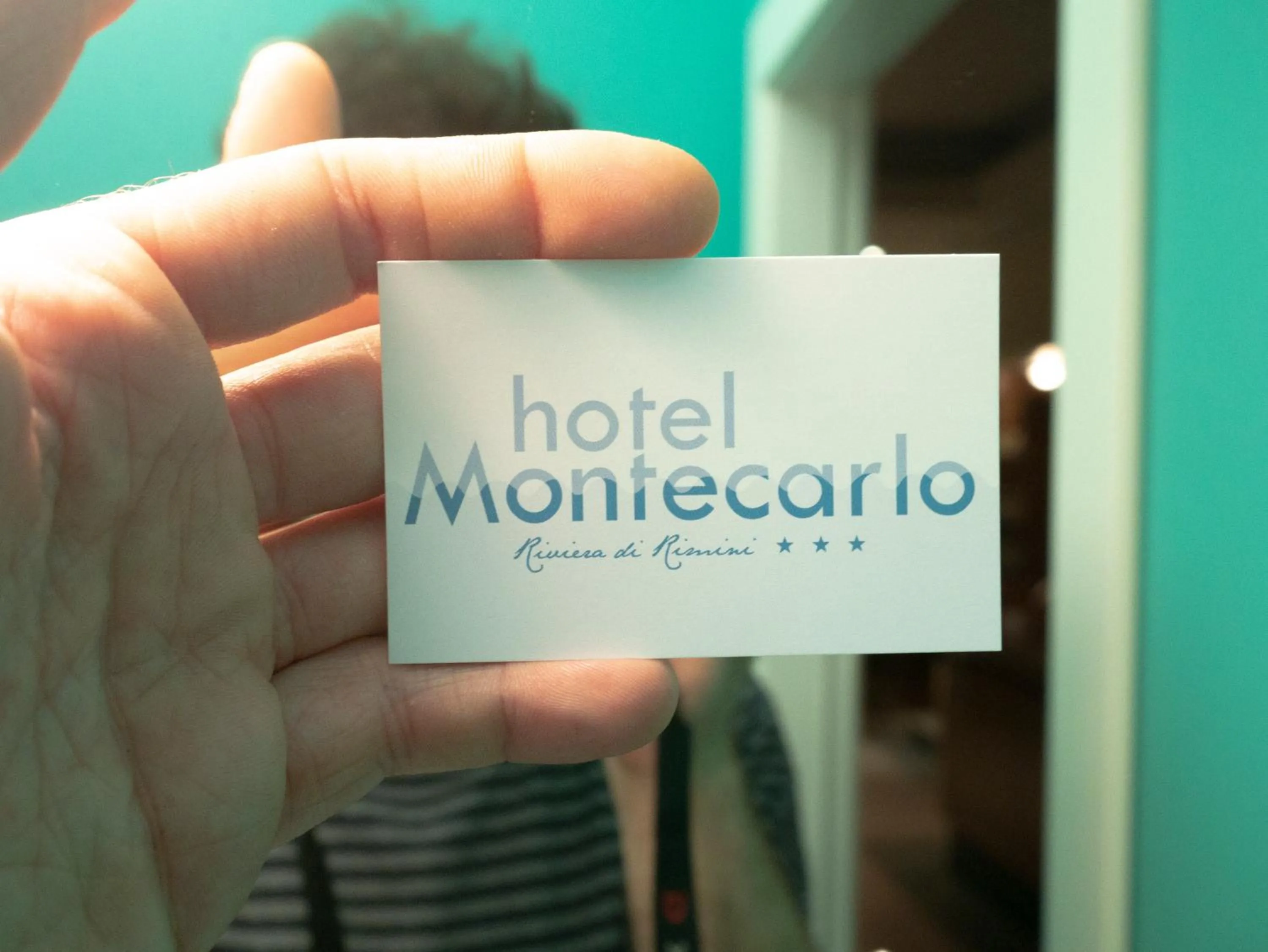 Property logo or sign in Hotel Montecarlo