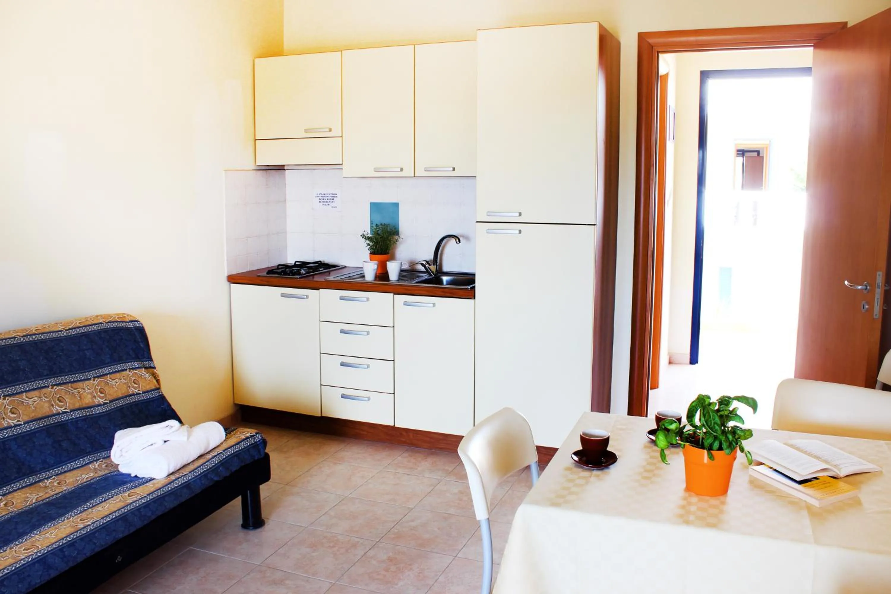 Kitchen or kitchenette in Residence Oasi Salento