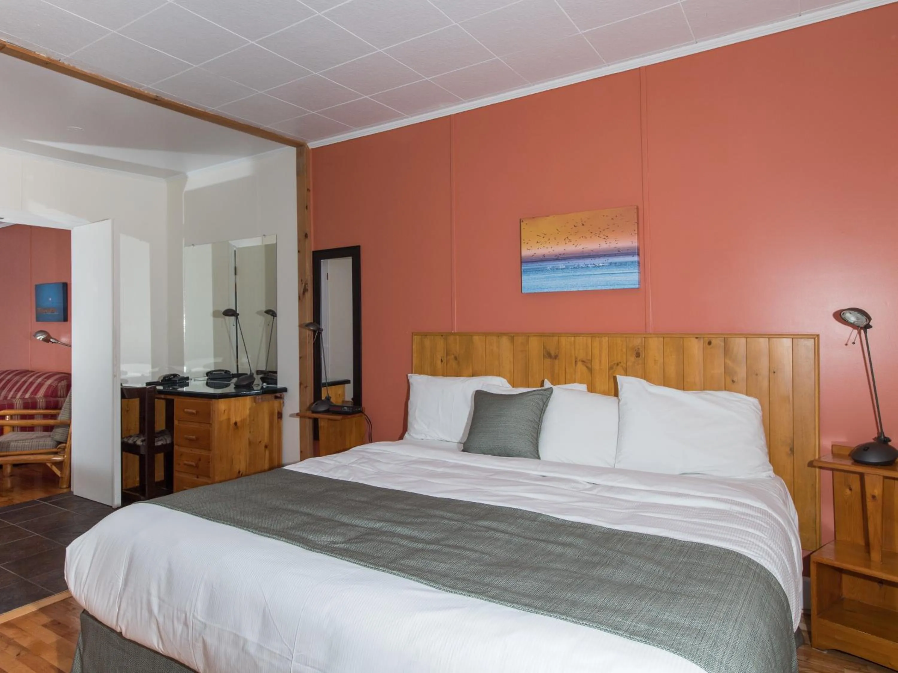 Bed in Au Pic de l'Aurore Motel-Chalets