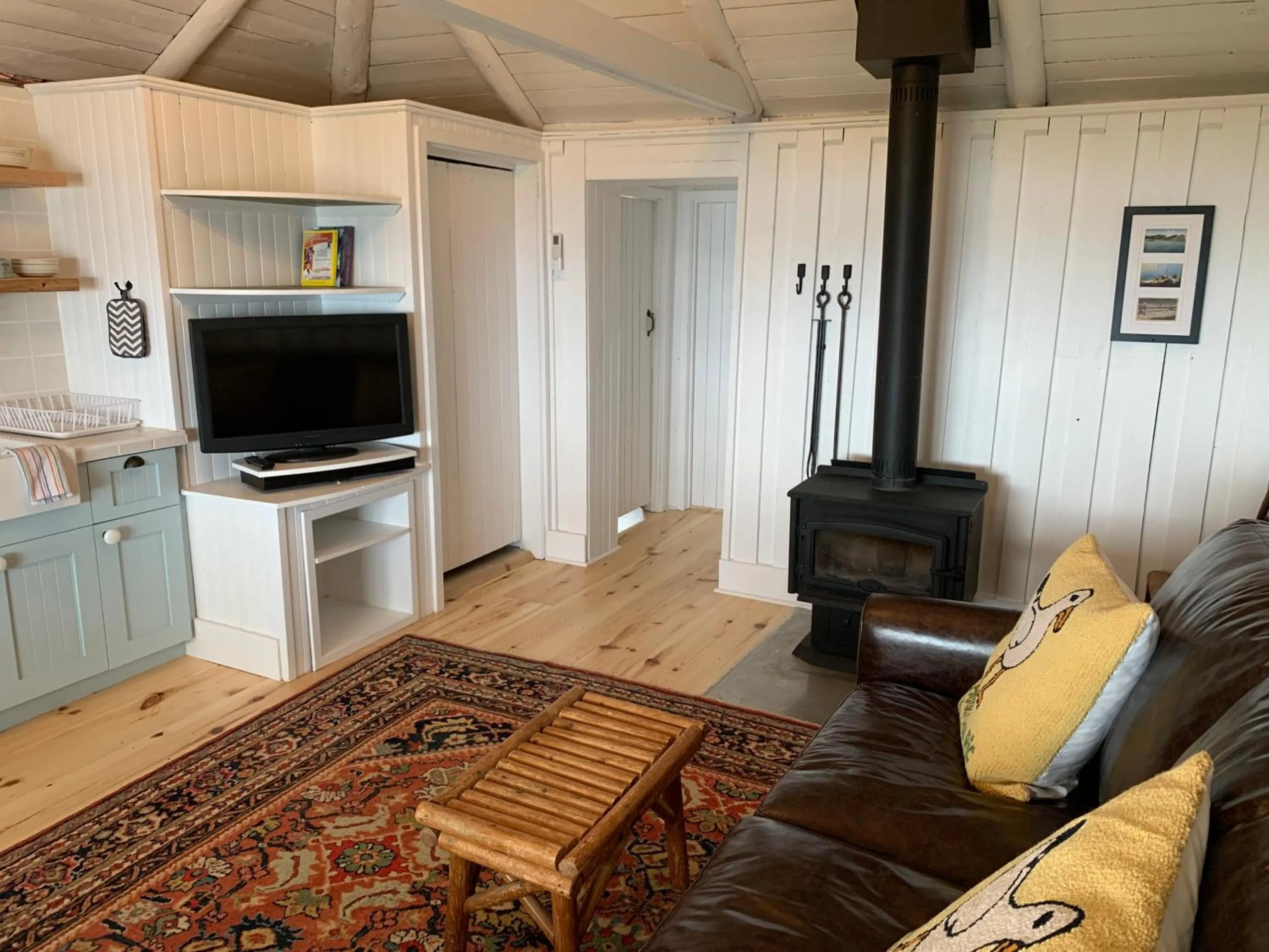 Communal lounge/ TV room in Au Pic de l'Aurore Motel-Chalets