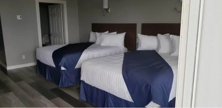 Bed in Hotel-Motel Fleur de Lys