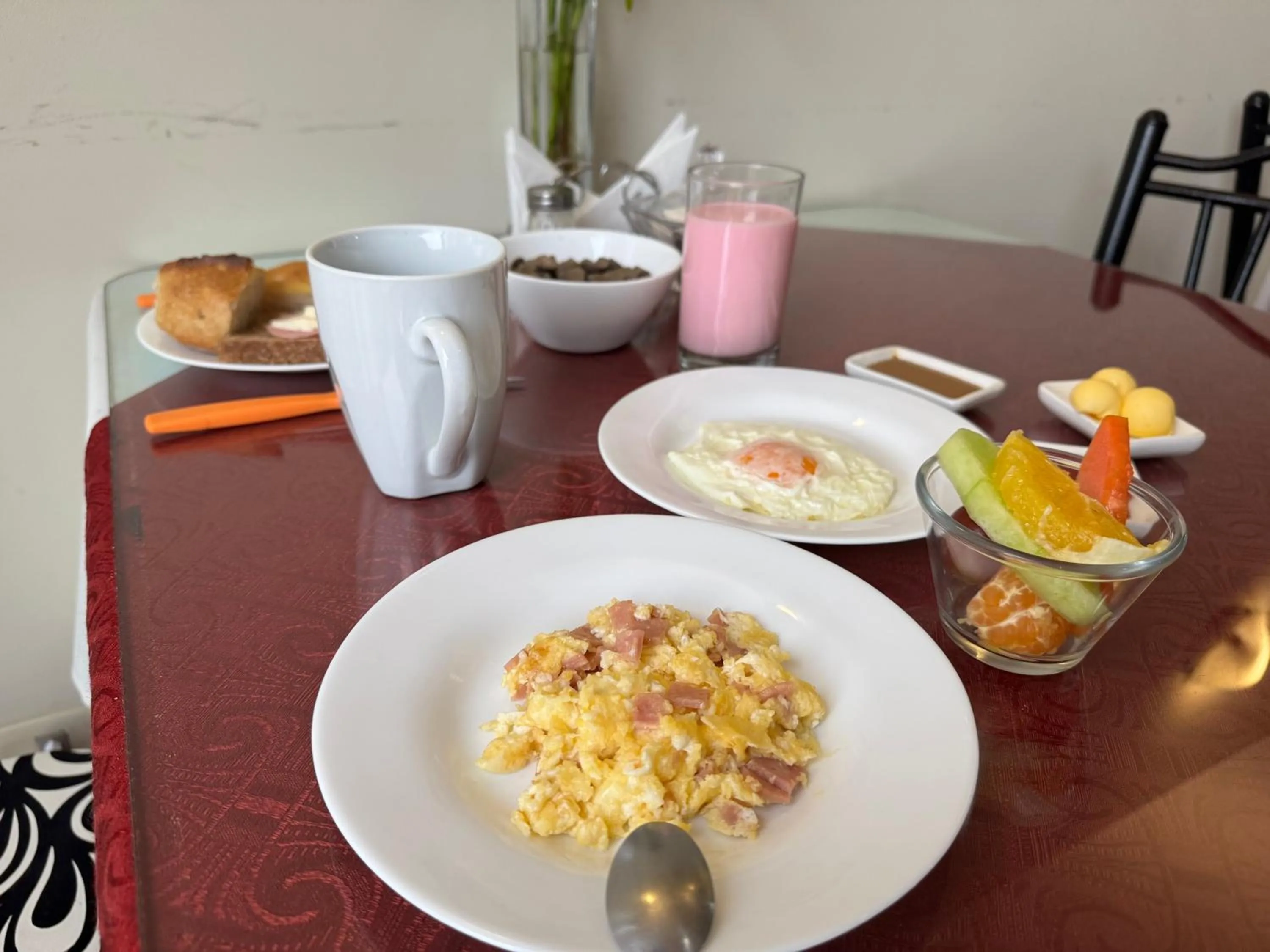 Continental breakfast in Luxstone Executive & Suites