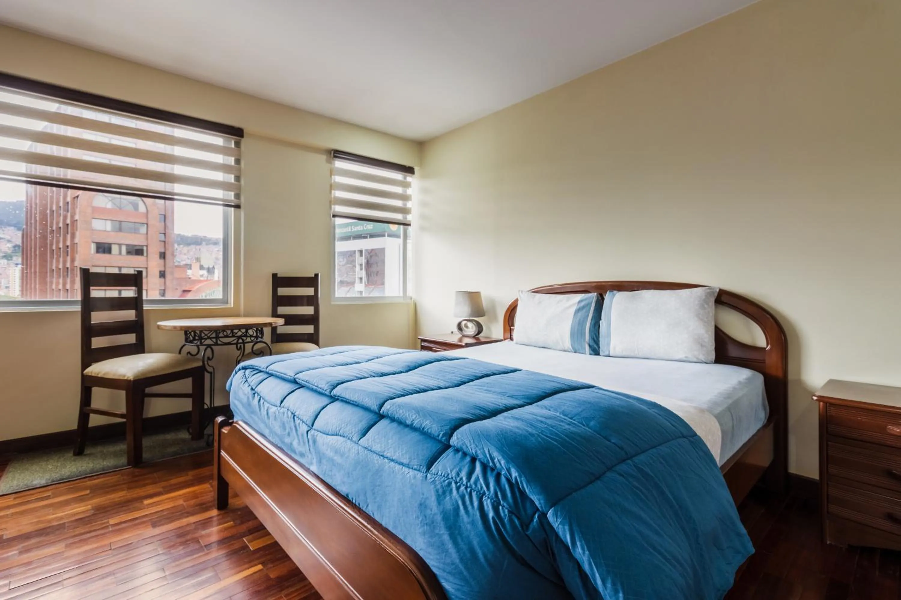 Bed in Luxstone Executive & Suites