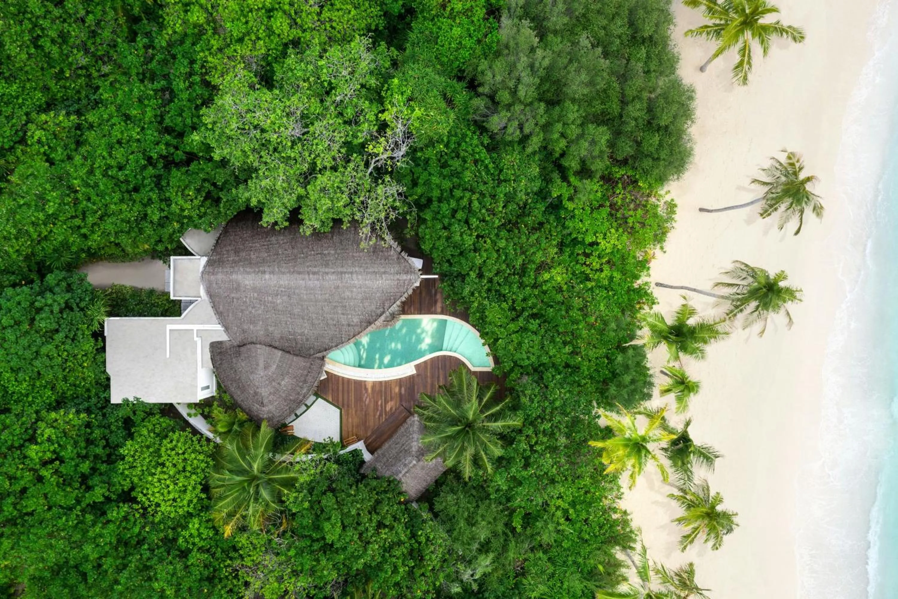 Swimming pool in JW Marriott Maldives Resort & Spa