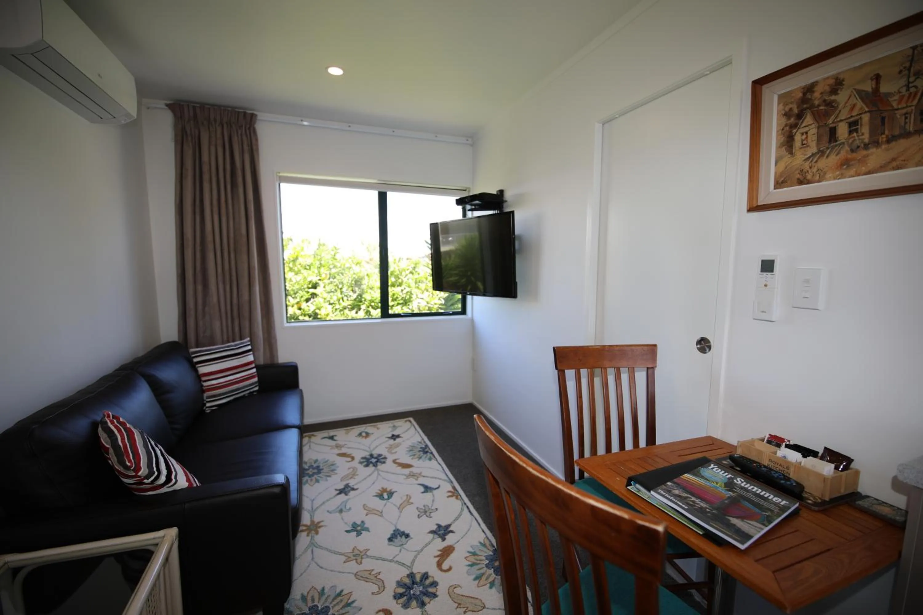 TV and multimedia in Blue Marlin Apartments