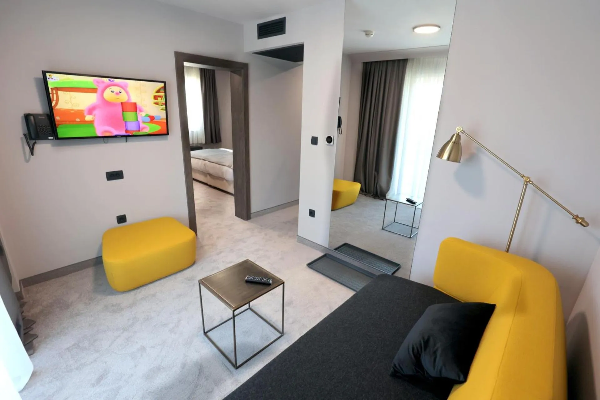 Living room, Bed in Hotel Milenij