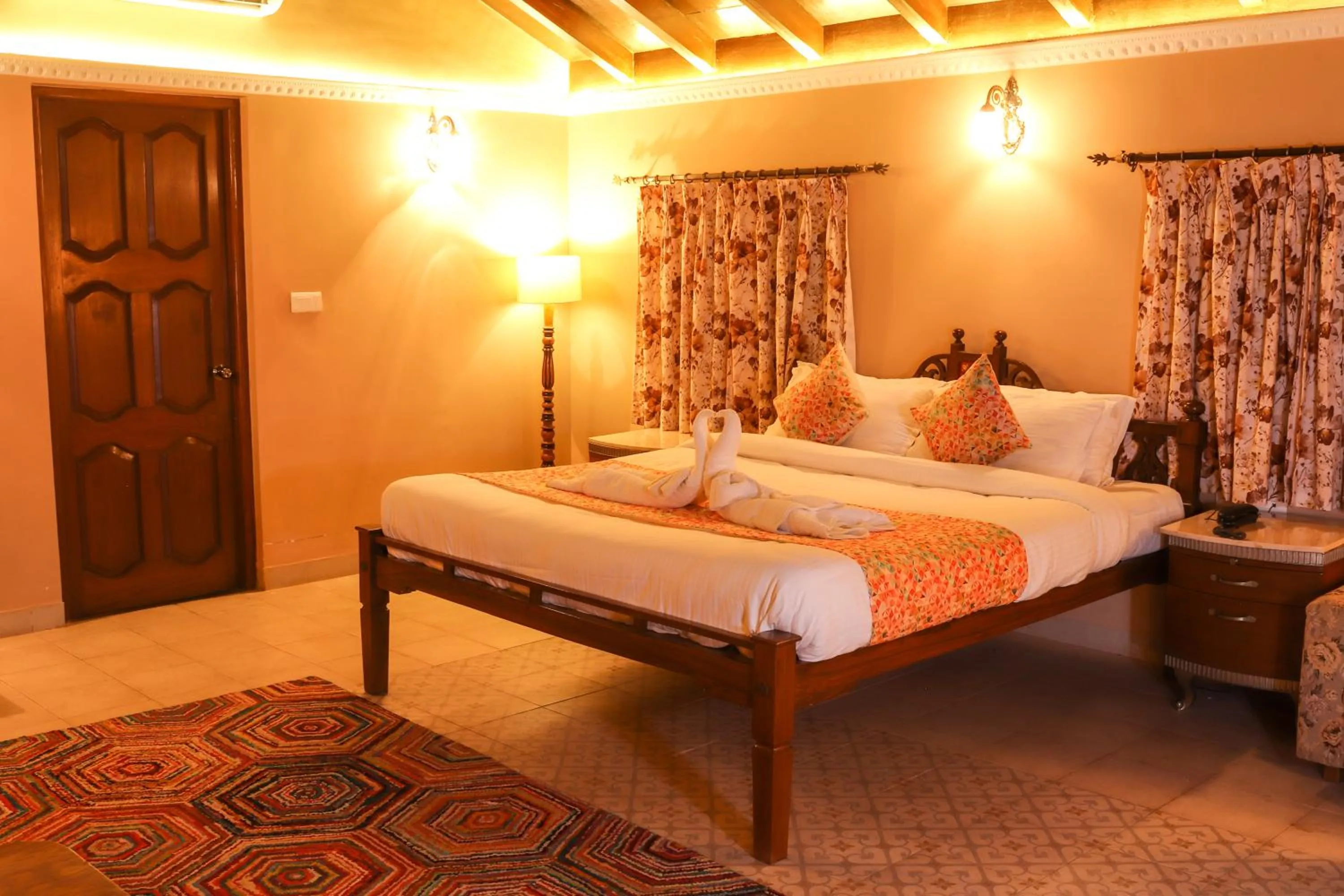 Bed in Surya Kiran Heritage Hotel