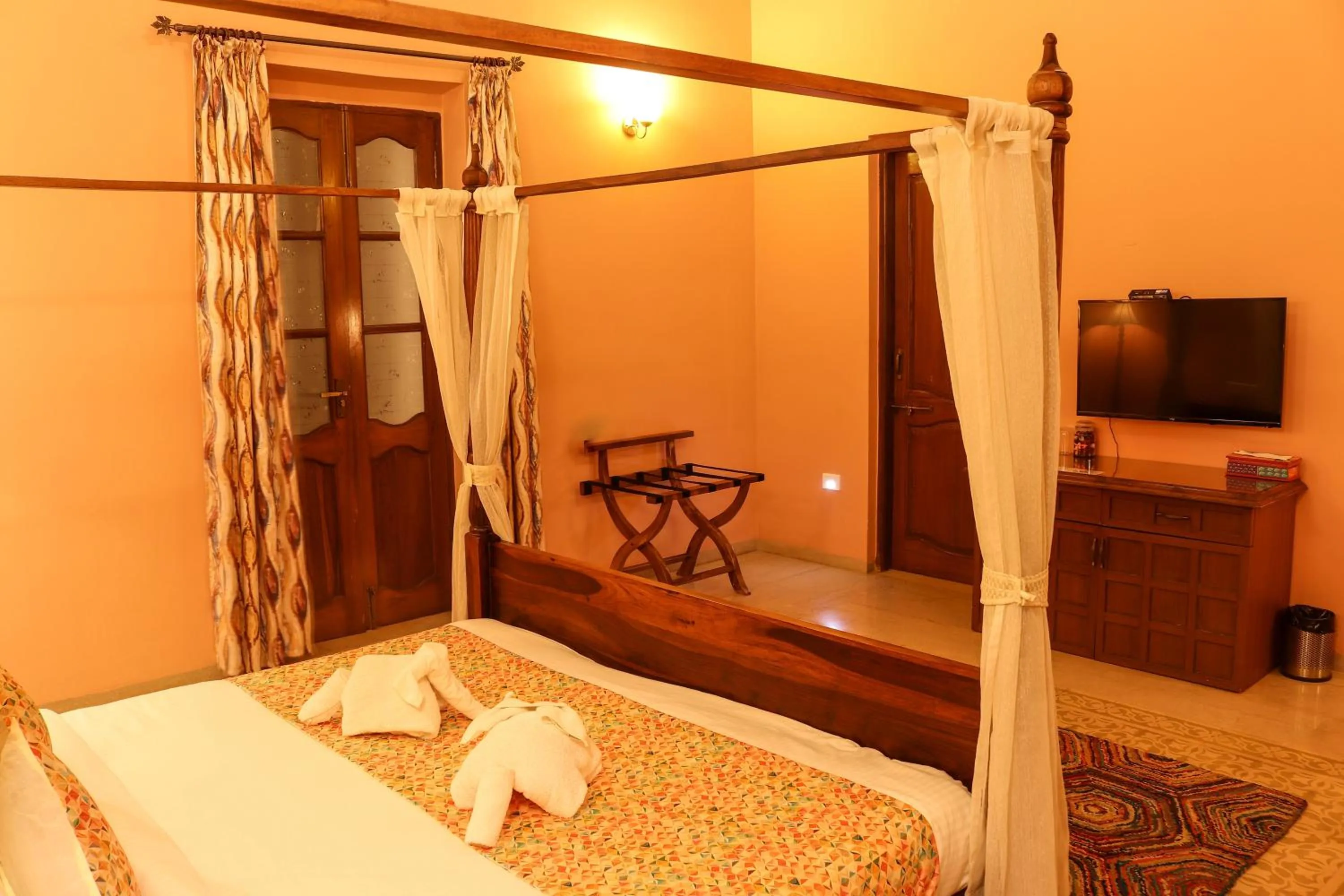 Bed in Surya Kiran Heritage Hotel