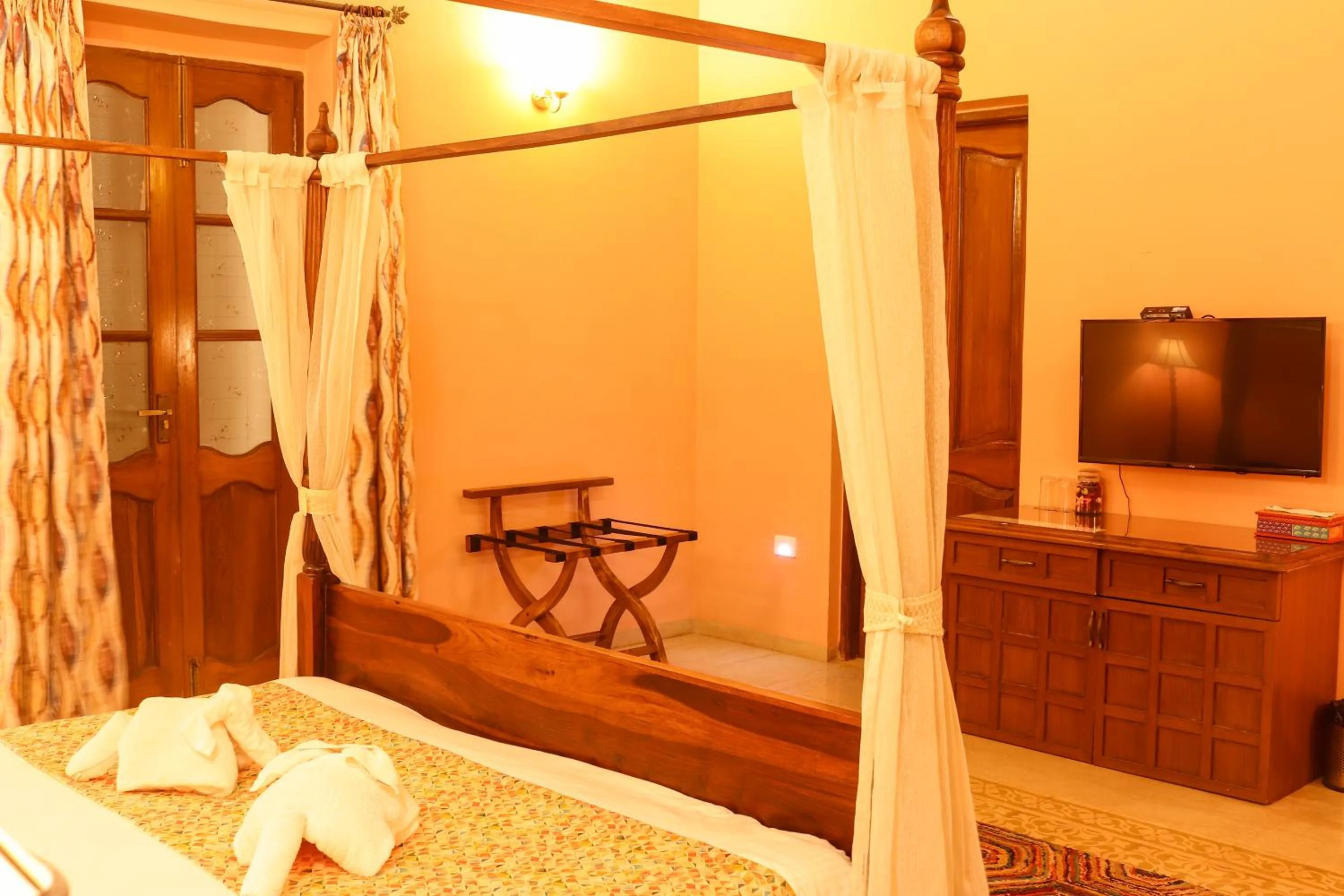 Bed in Surya Kiran Heritage Hotel