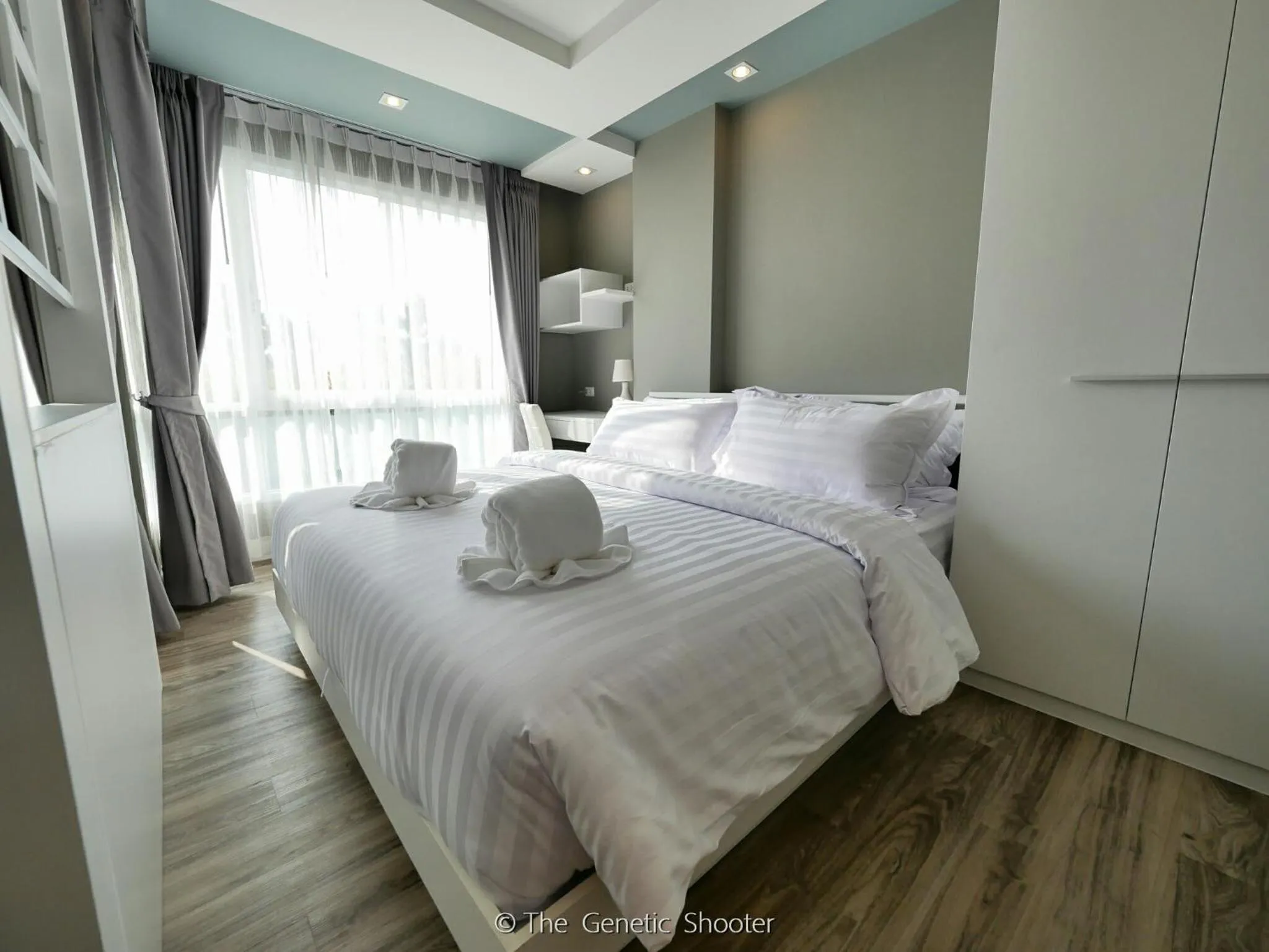 Bed in Wisdom Hotel & Residence
