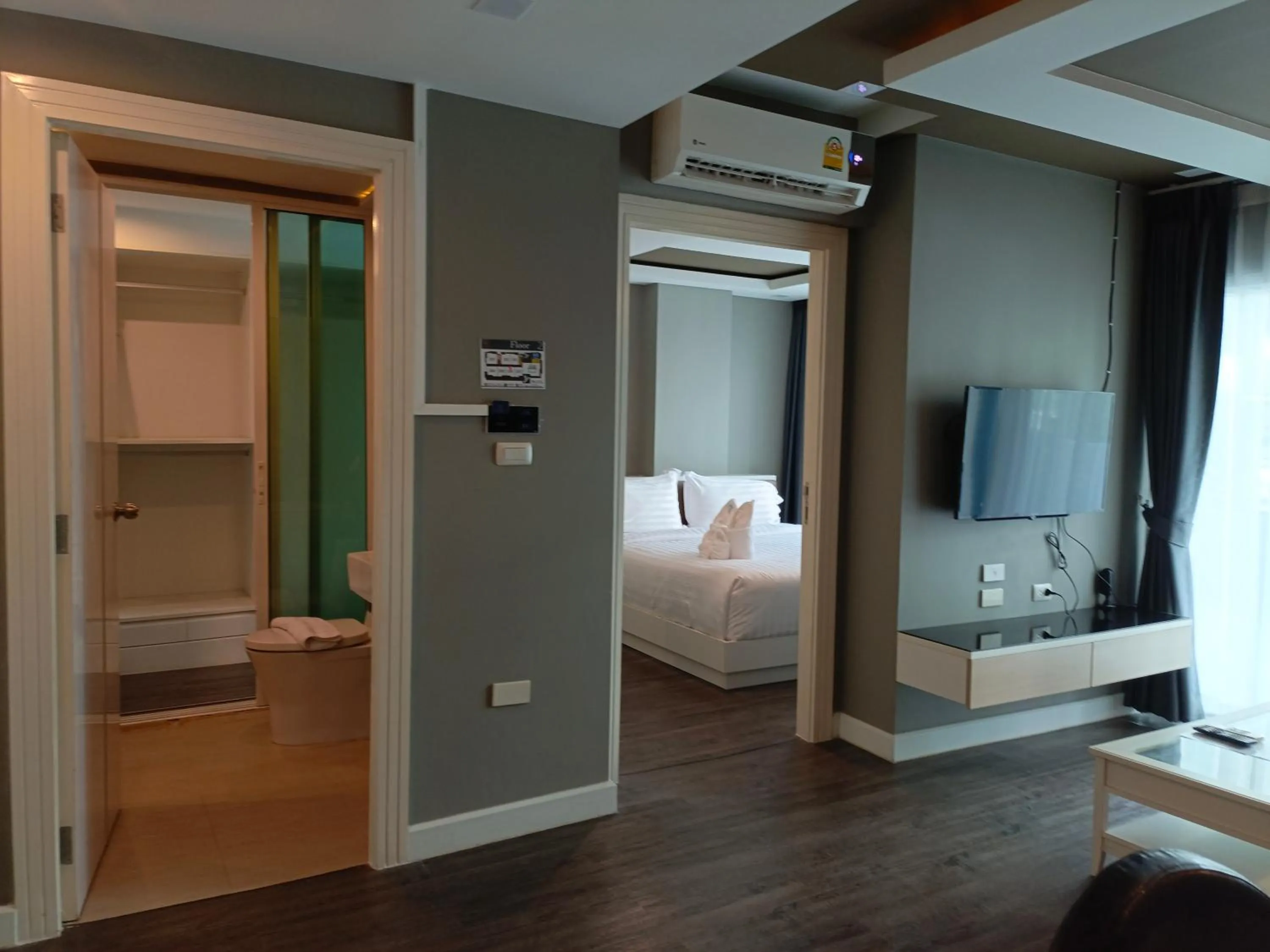 Bed in Wisdom Hotel & Residence