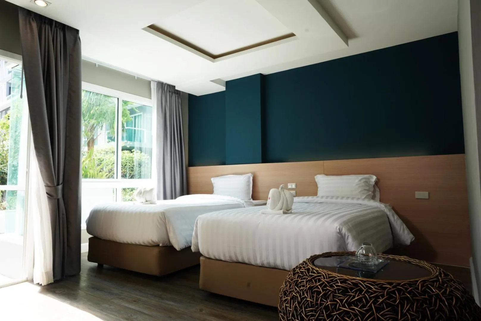 Bed in Wisdom Hotel & Residence