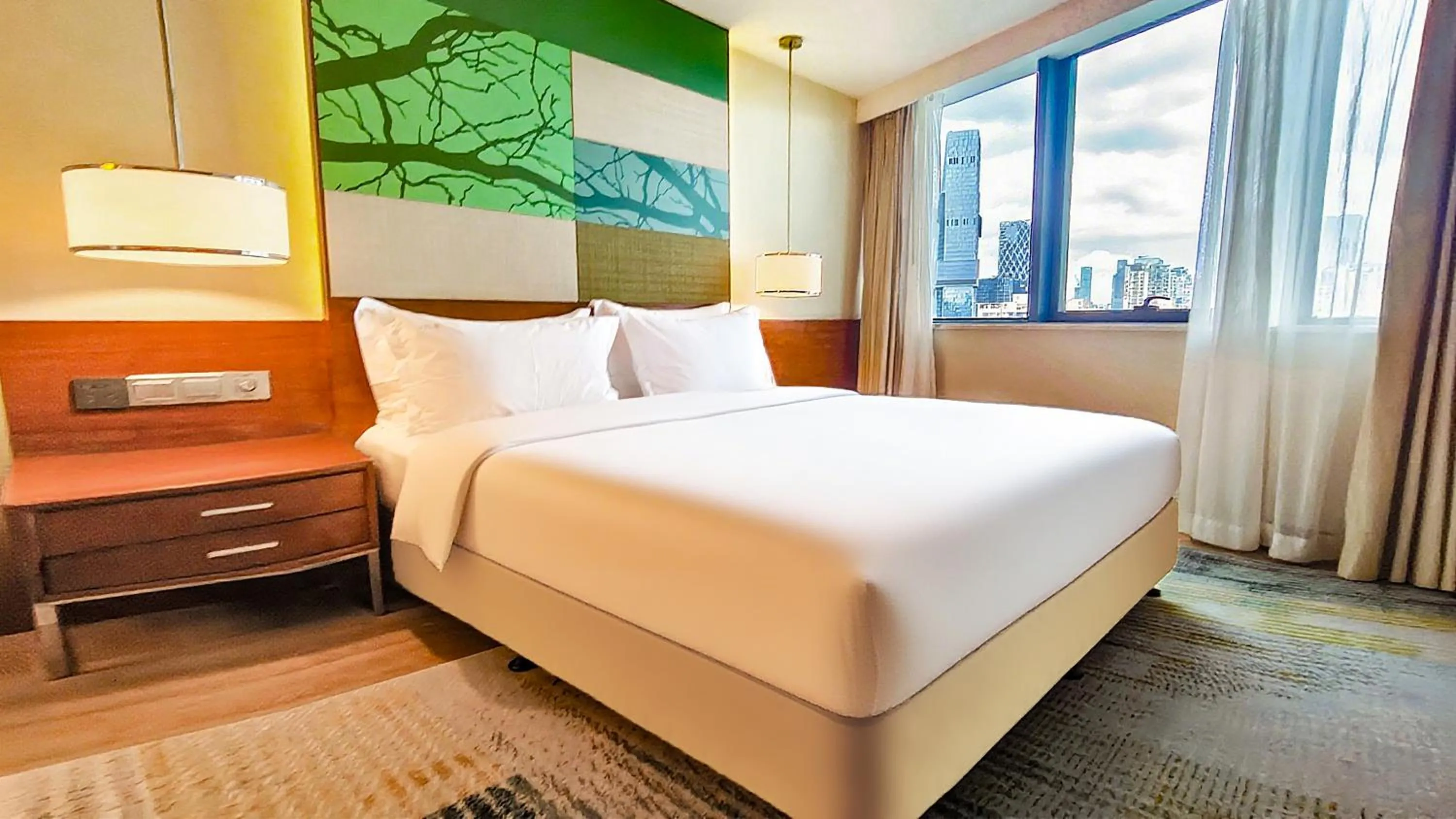 Bed in Holiday Inn Shenzhen Donghua by IHG