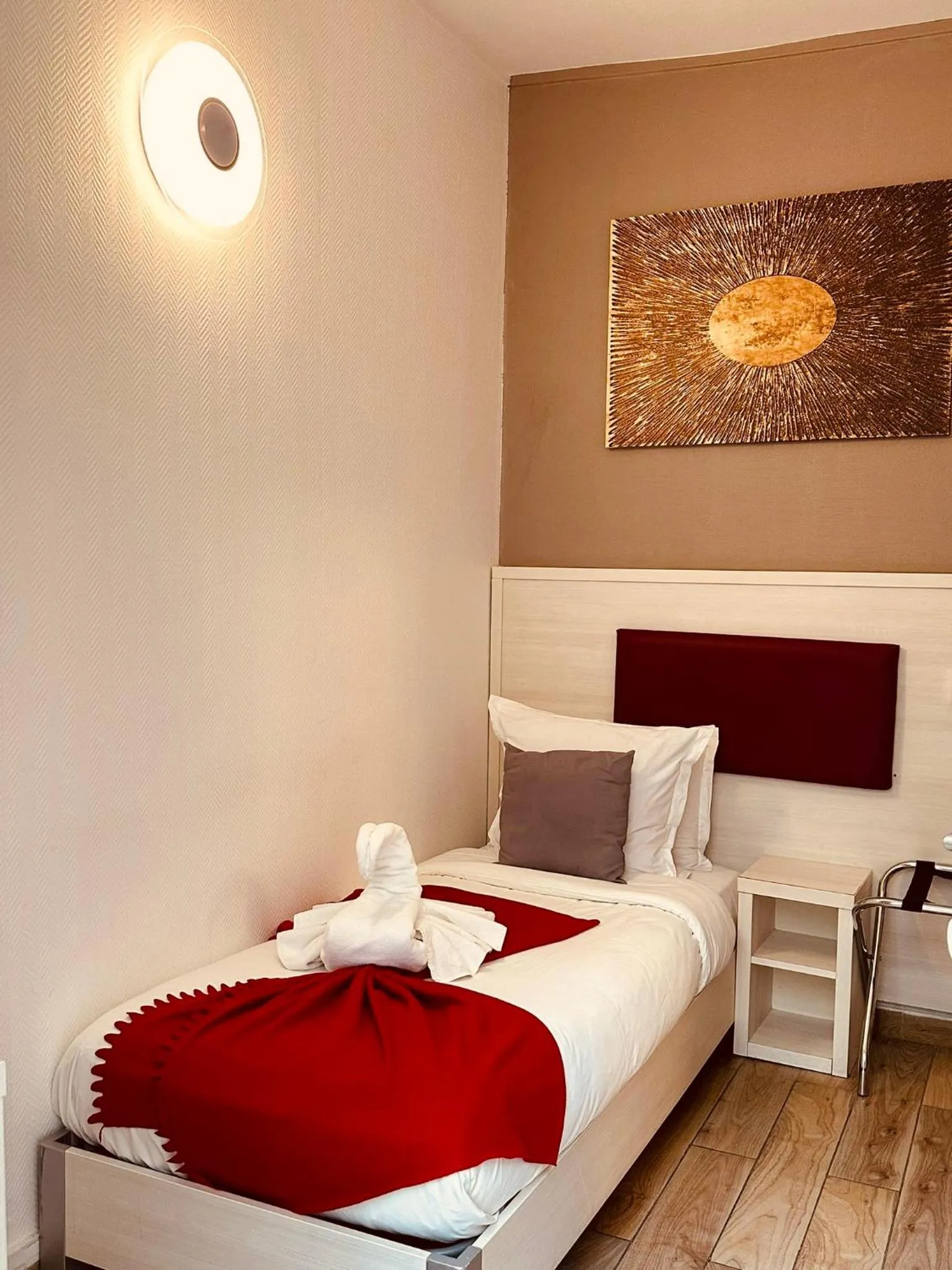 Photo of the whole room, Bed in Pavillon Opéra Lafayette