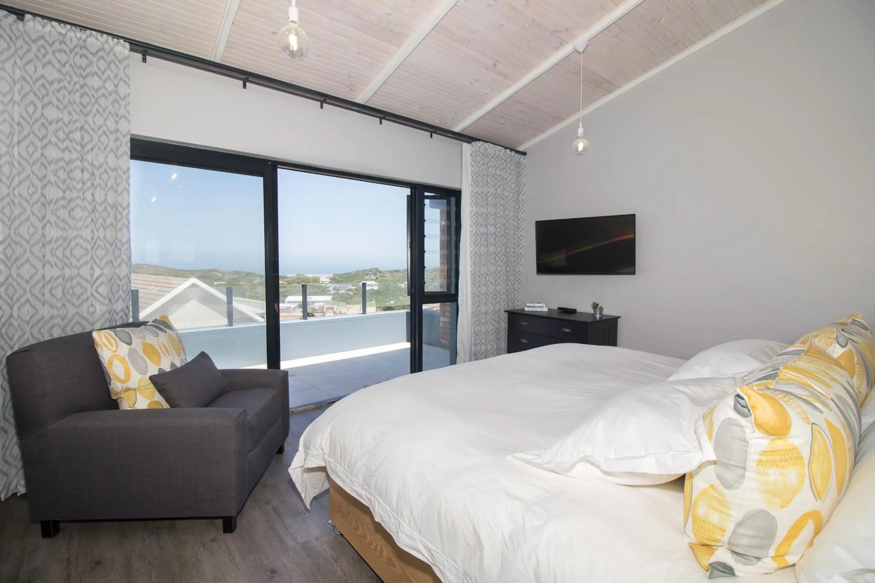 Bed in Sky Blue Guest House