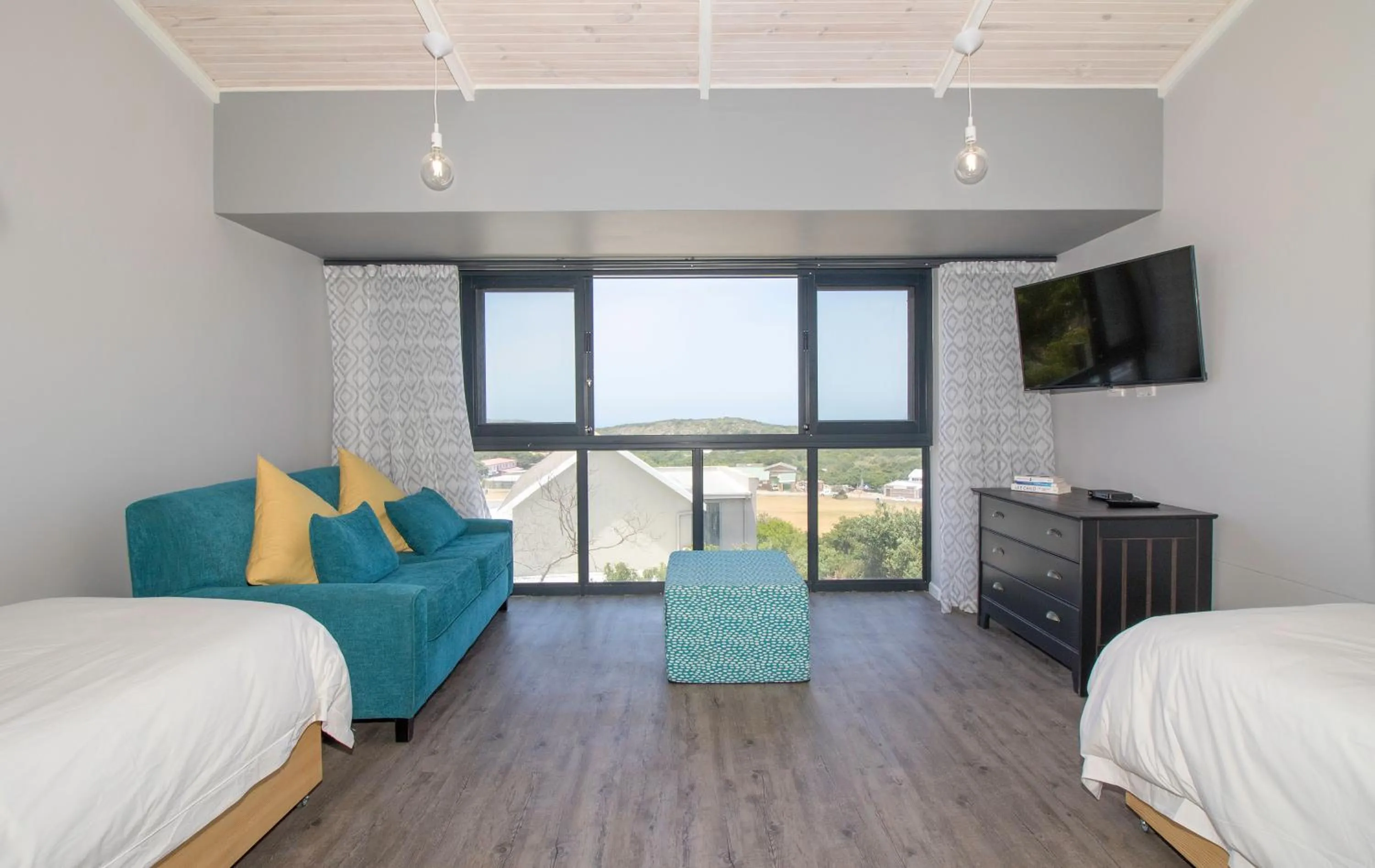 Bed in Sky Blue Guest House