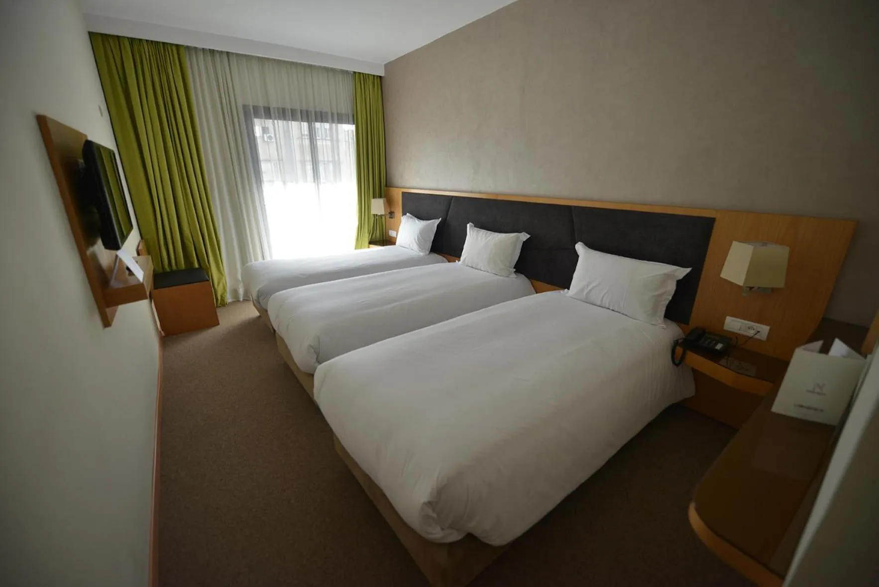 Bed in Annakhil Hotel