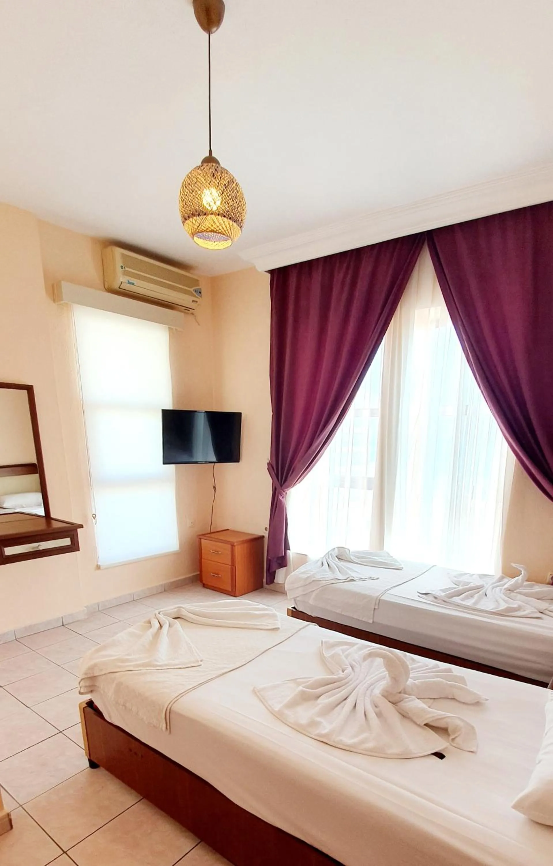 Bed in Palmen Apart Hotel