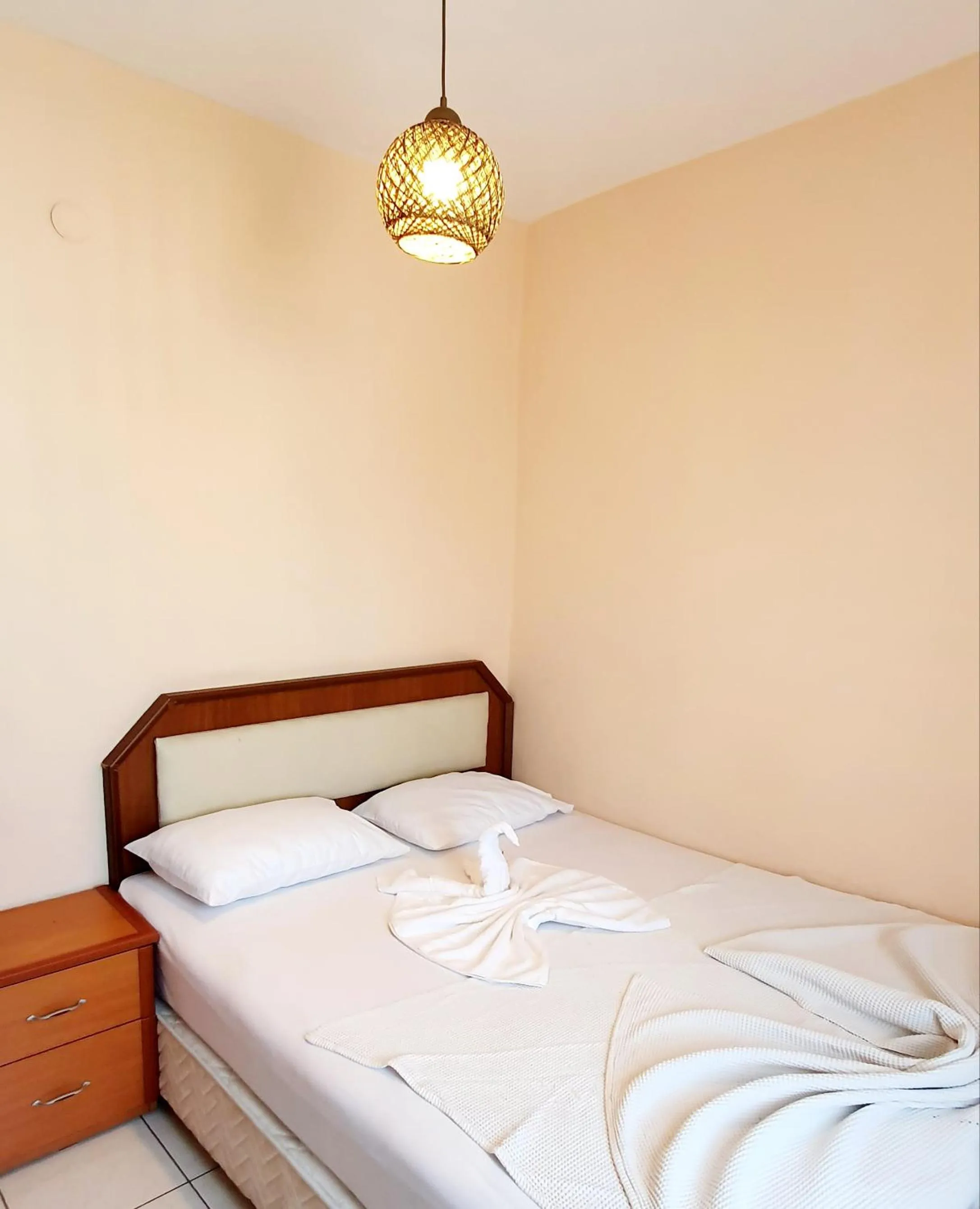 Bed in Palmen Apart Hotel