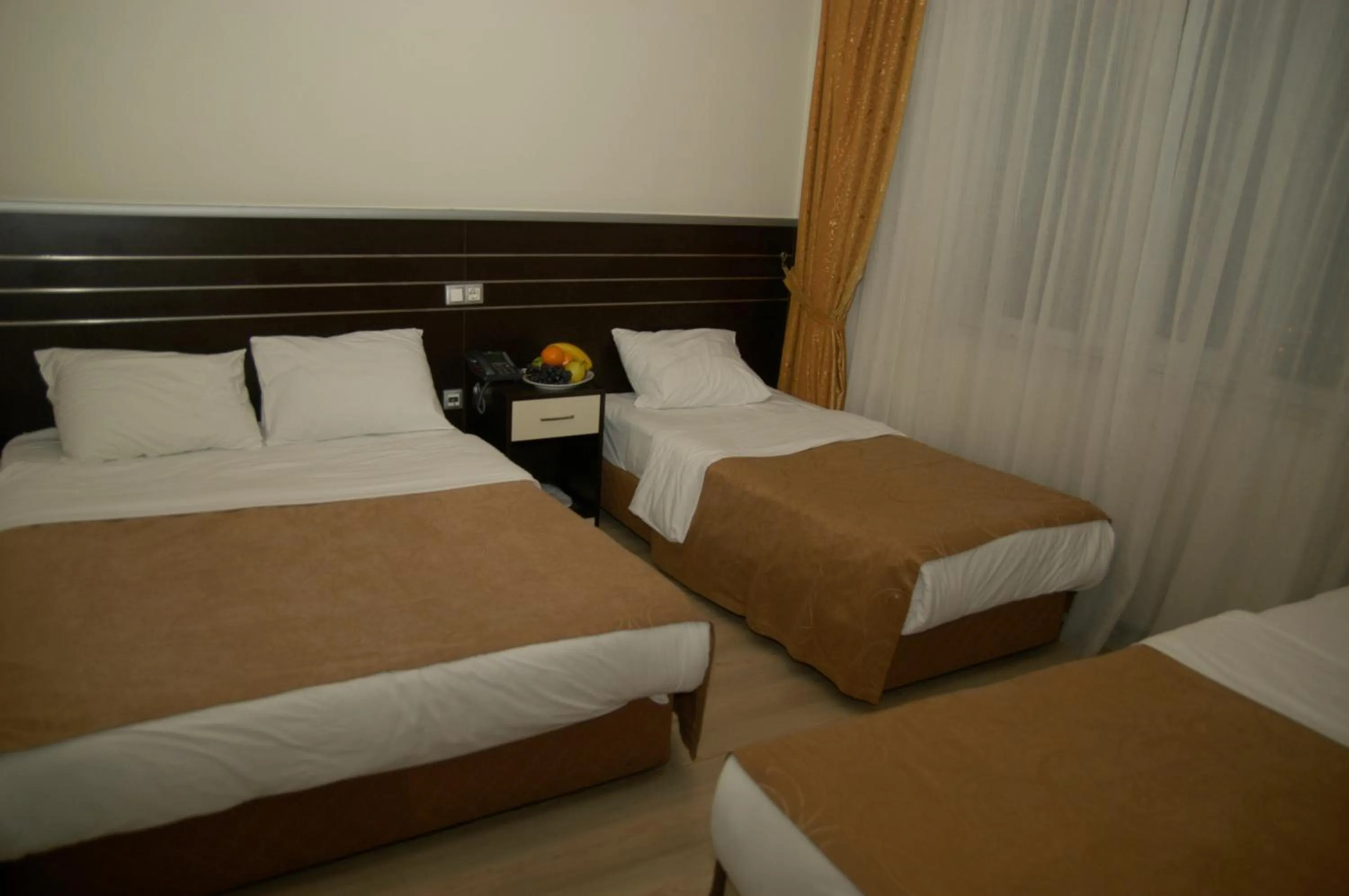 Bed in Merdan Hotel