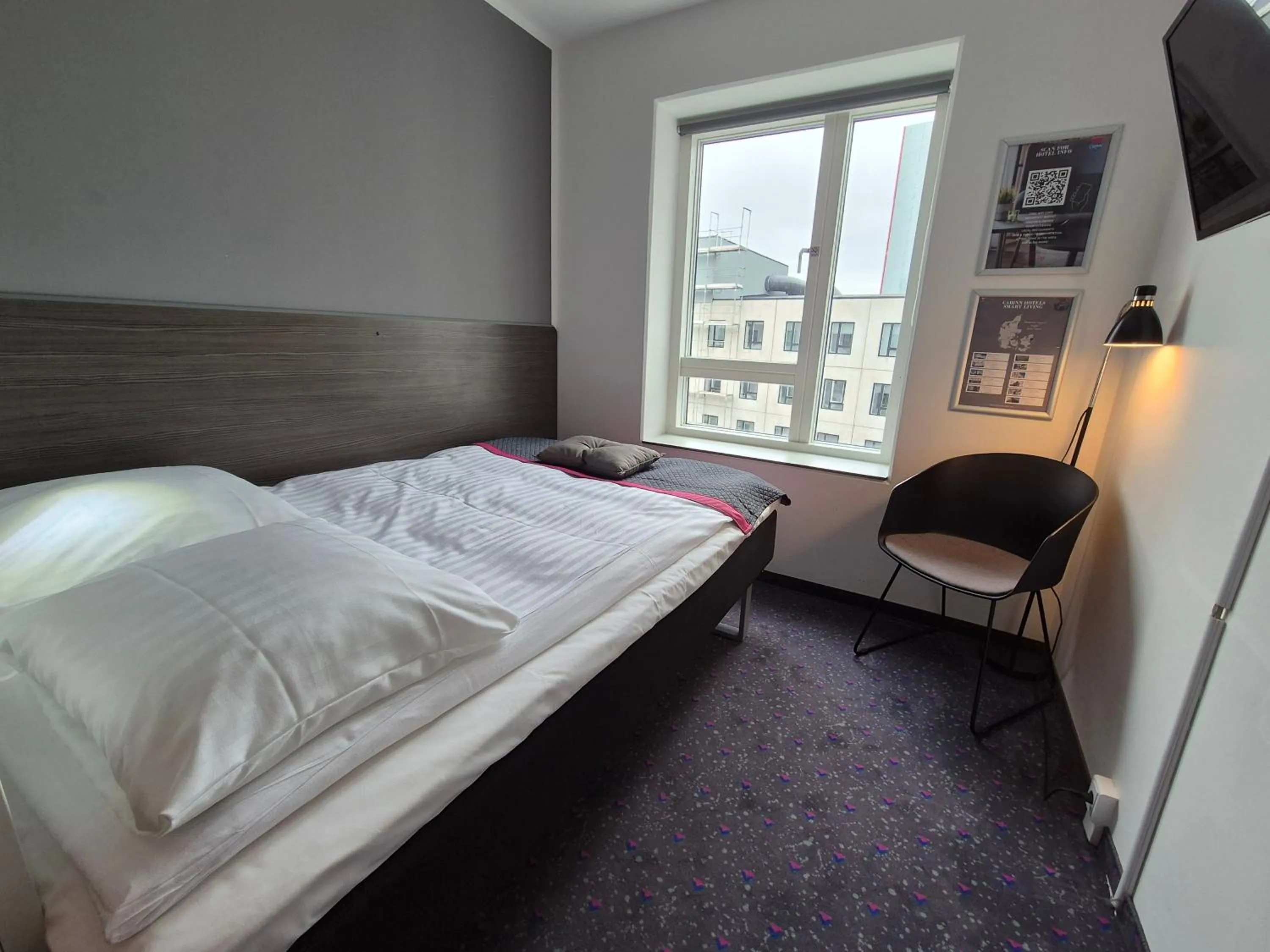 Bed in Cabinn Apartments