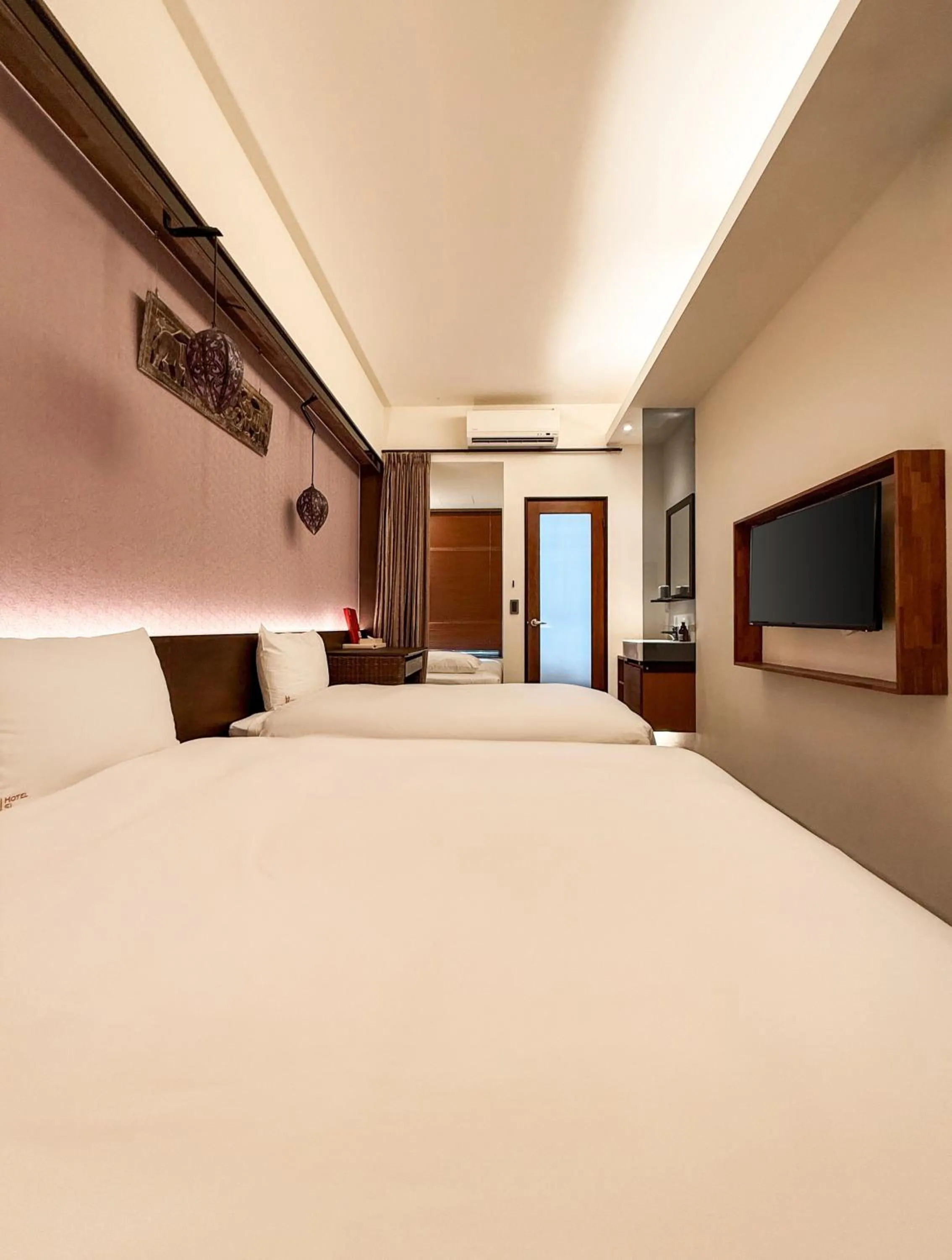 Bed in 嬉安平 Si Anping by Hotel Si