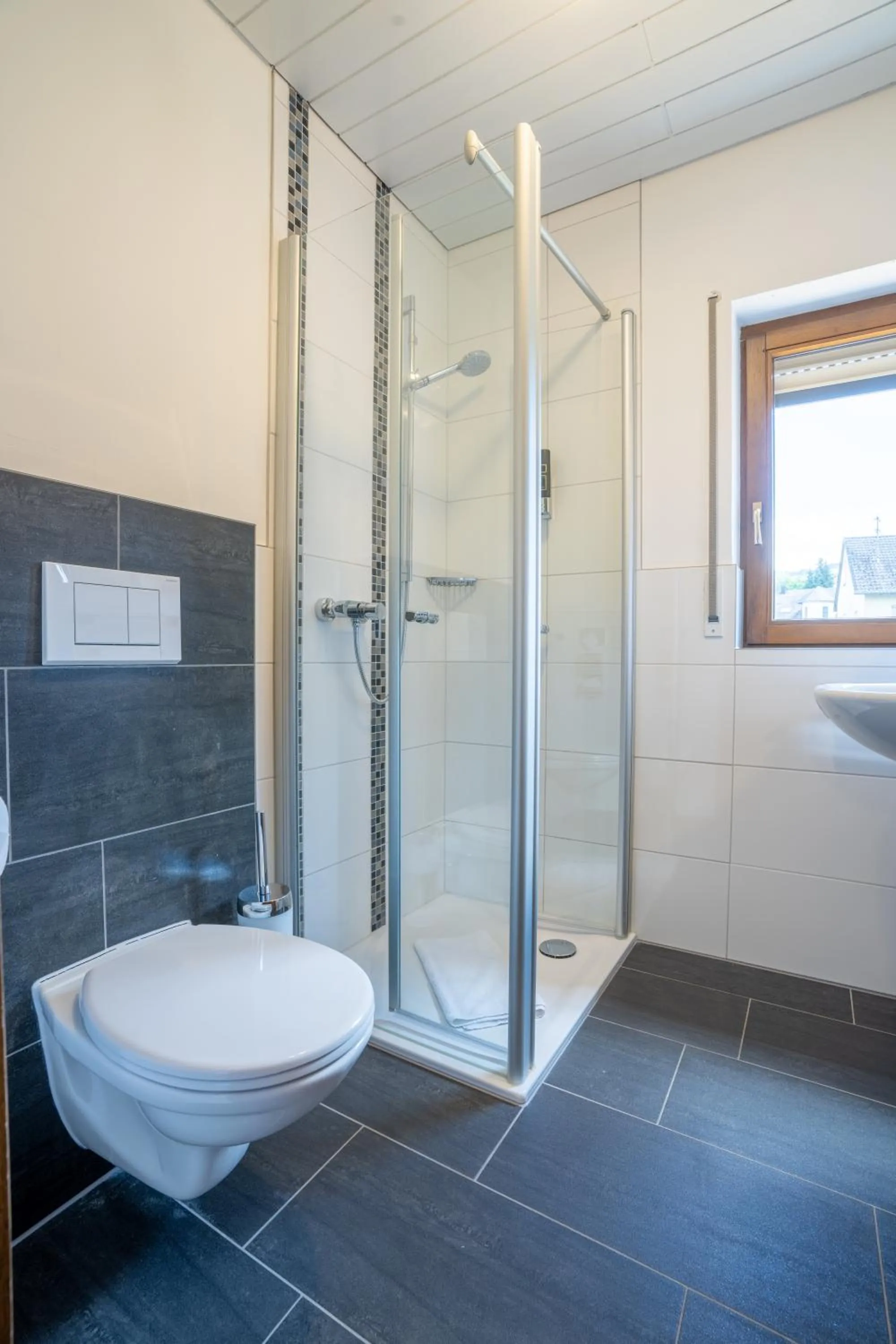 Bathroom in Mühlengarten by Relax Inn - Staffless with Self Check In & Free Parking
