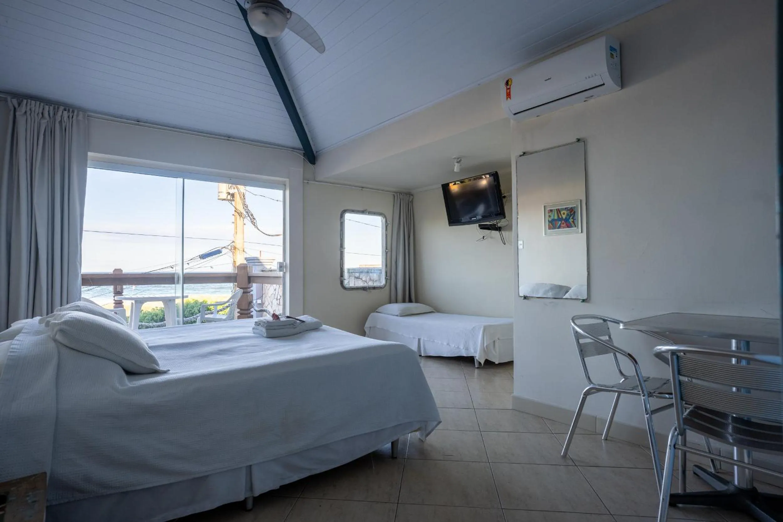 Bed in Pousada On Shore