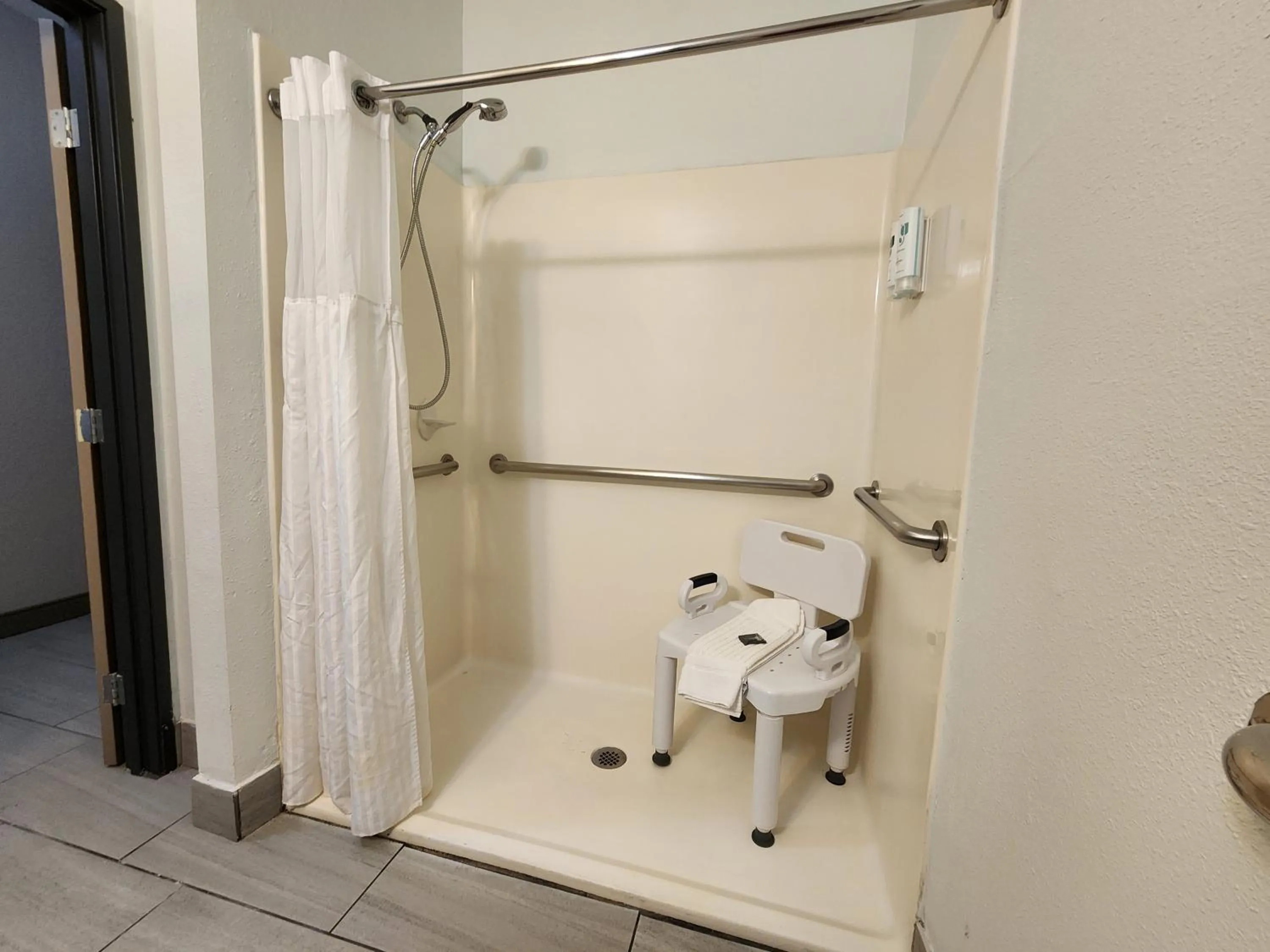 Shower in Country Inn & Suites by Radisson, Topeka West, KS