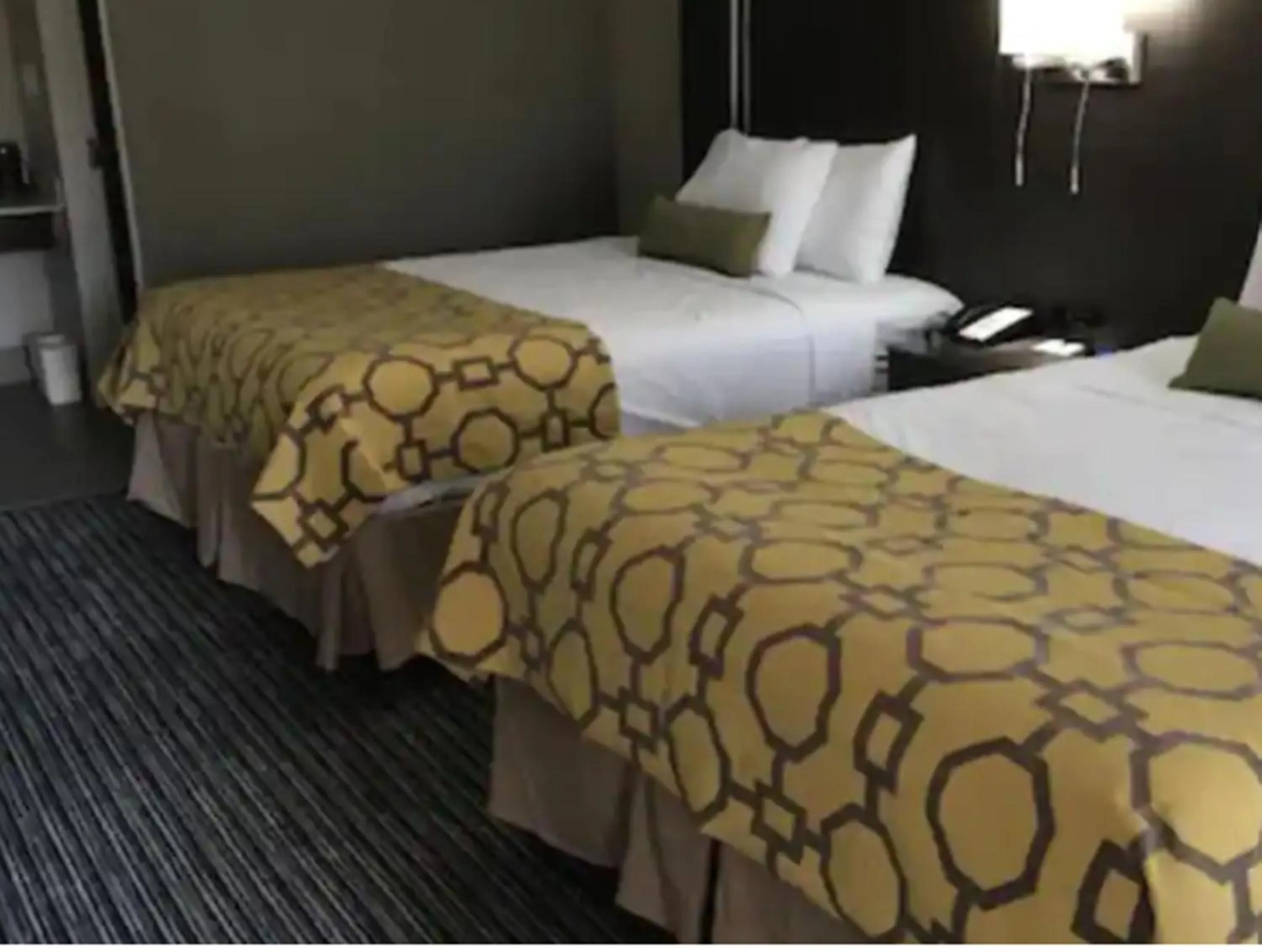 Bed in Baymont by Wyndham Topeka