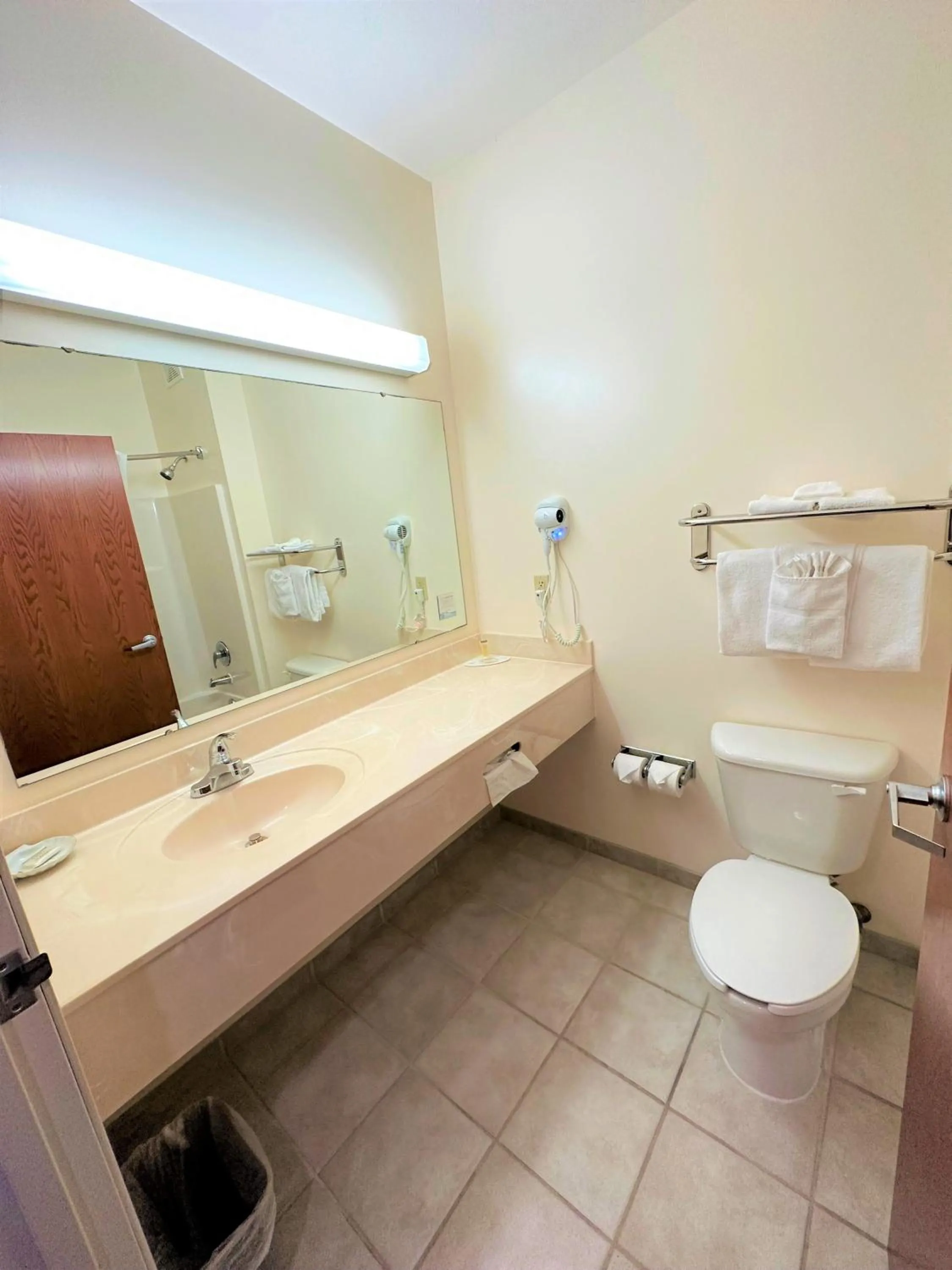 Bathroom in Super 8 by Wyndham Topeka at Forbes Landing