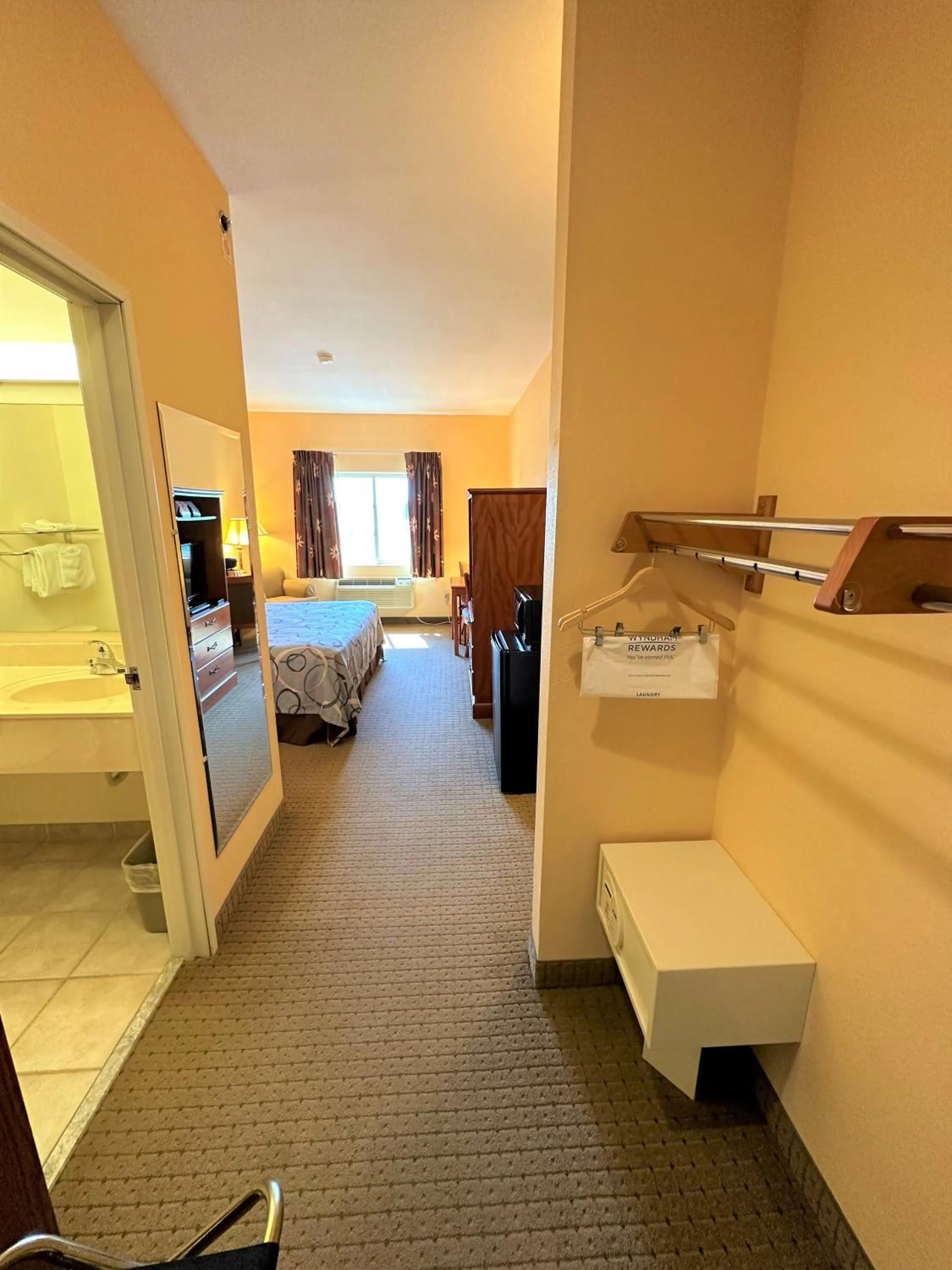 Photo of the whole room, Bed in Super 8 by Wyndham Topeka at Forbes Landing