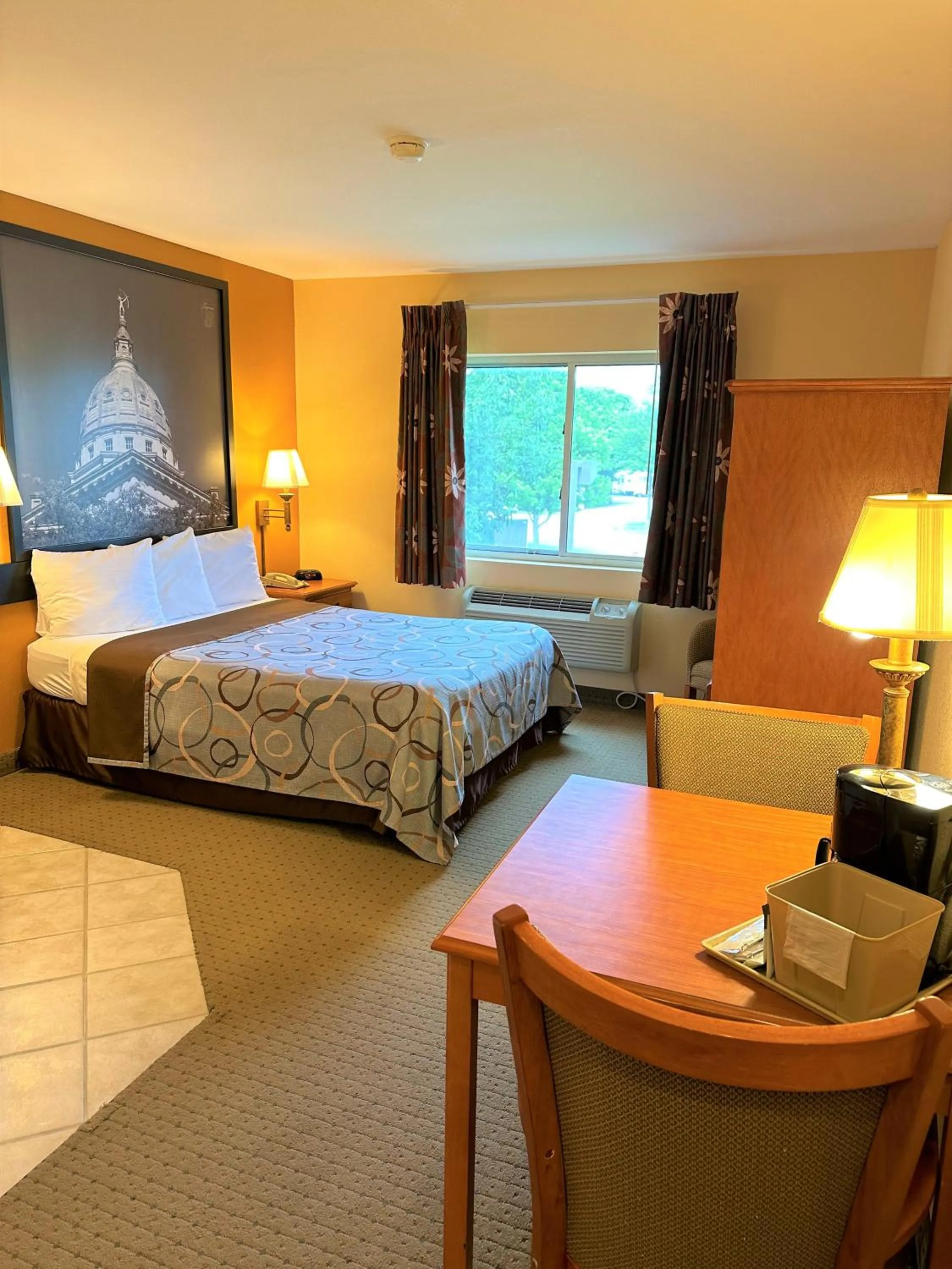 Bed in Super 8 by Wyndham Topeka at Forbes Landing