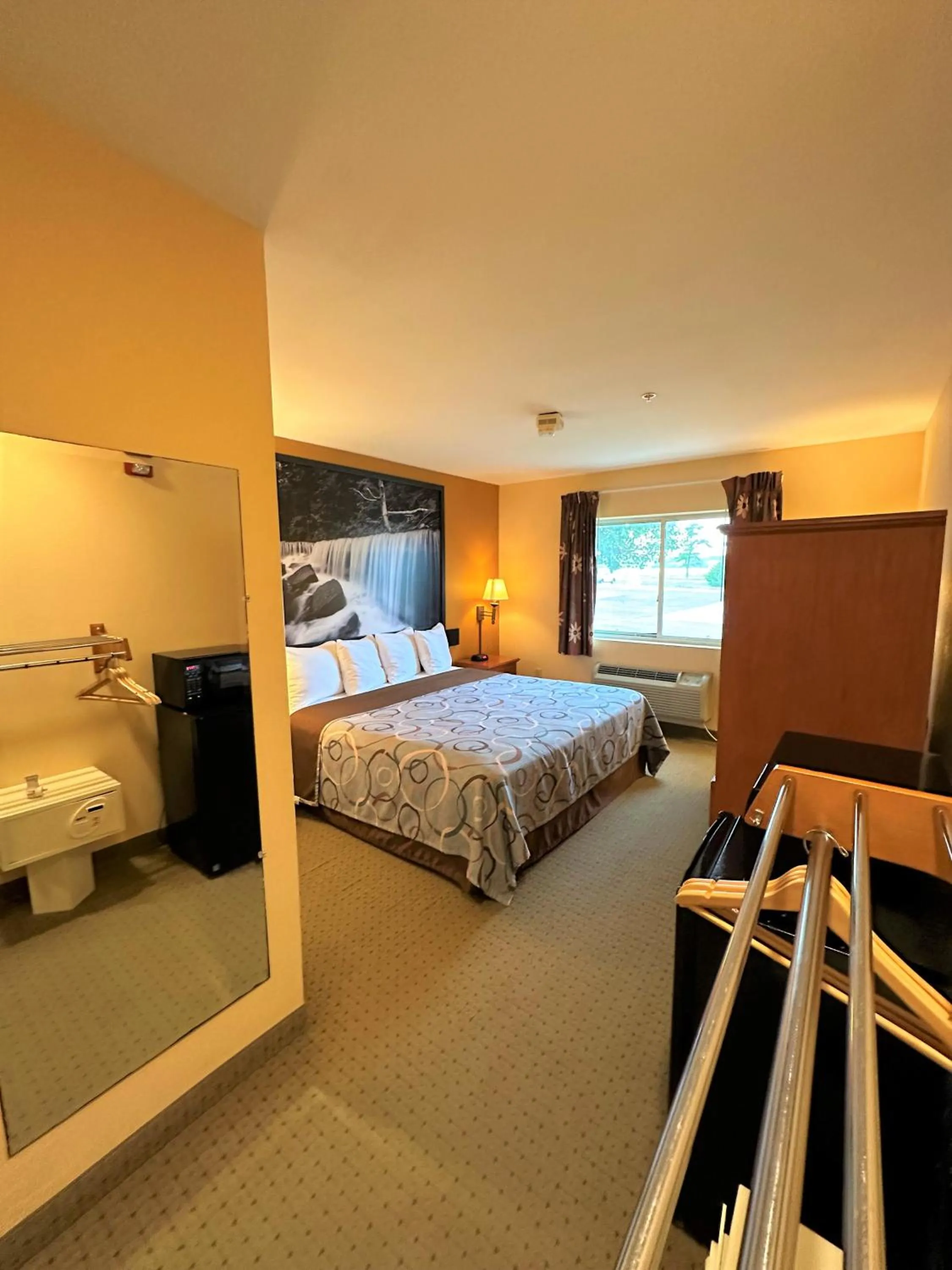 Photo of the whole room, Bed in Super 8 by Wyndham Topeka at Forbes Landing
