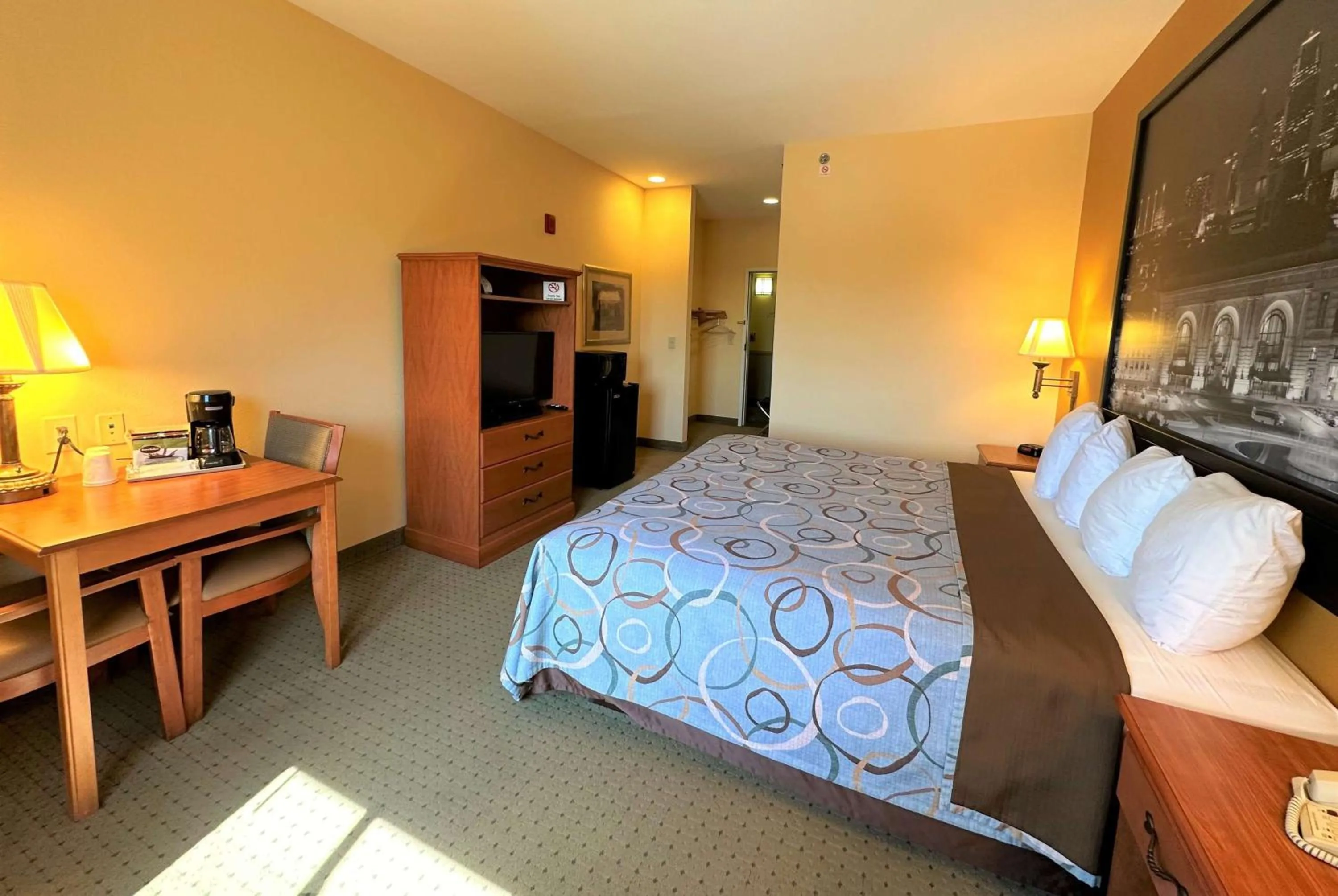 Photo of the whole room, Bed in Super 8 by Wyndham Topeka at Forbes Landing