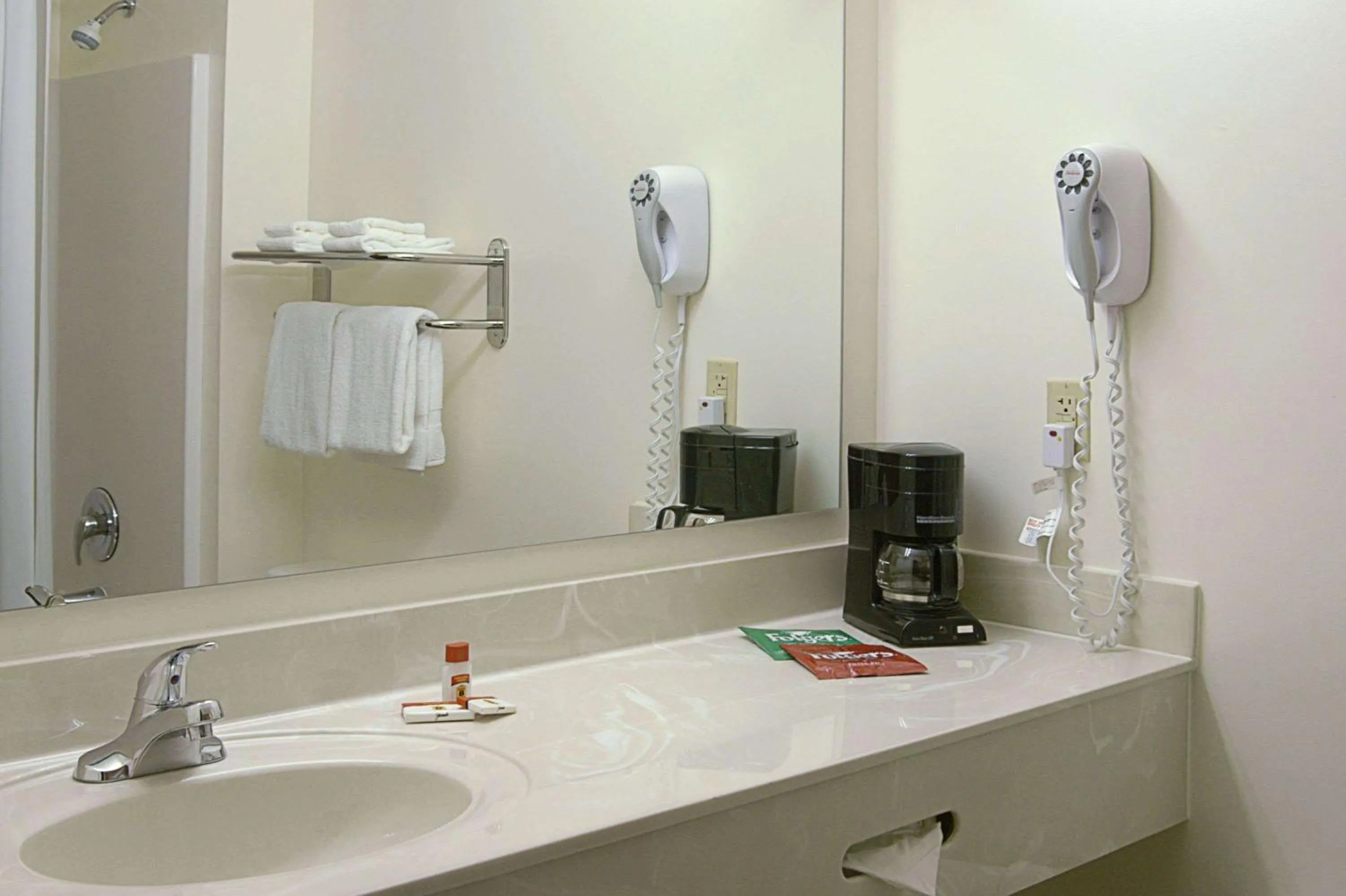 Bedroom in Super 8 by Wyndham Topeka at Forbes Landing