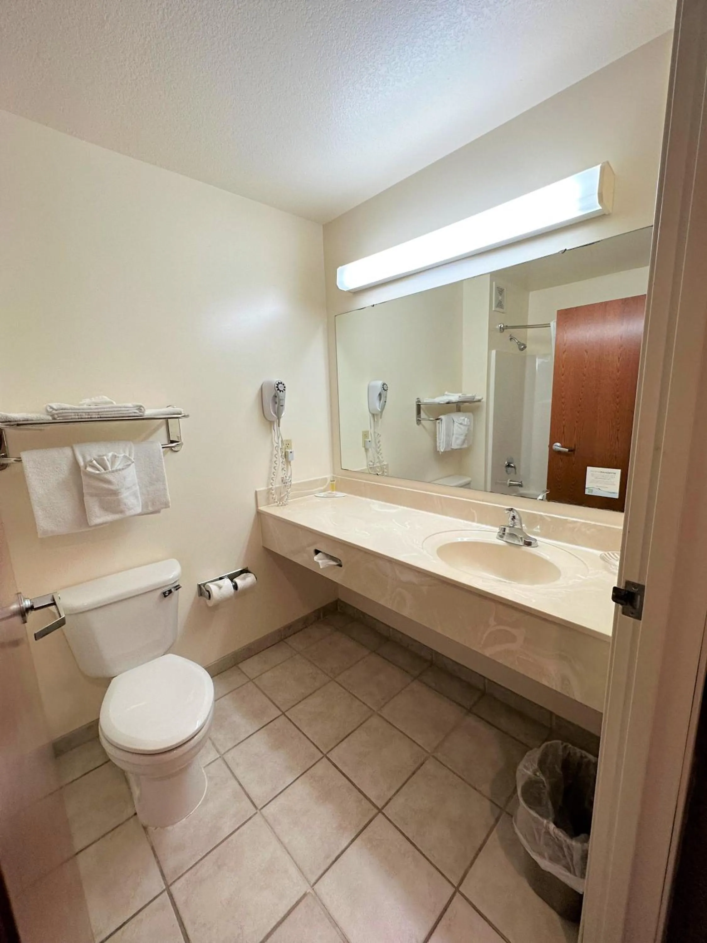Bathroom in Super 8 by Wyndham Topeka at Forbes Landing