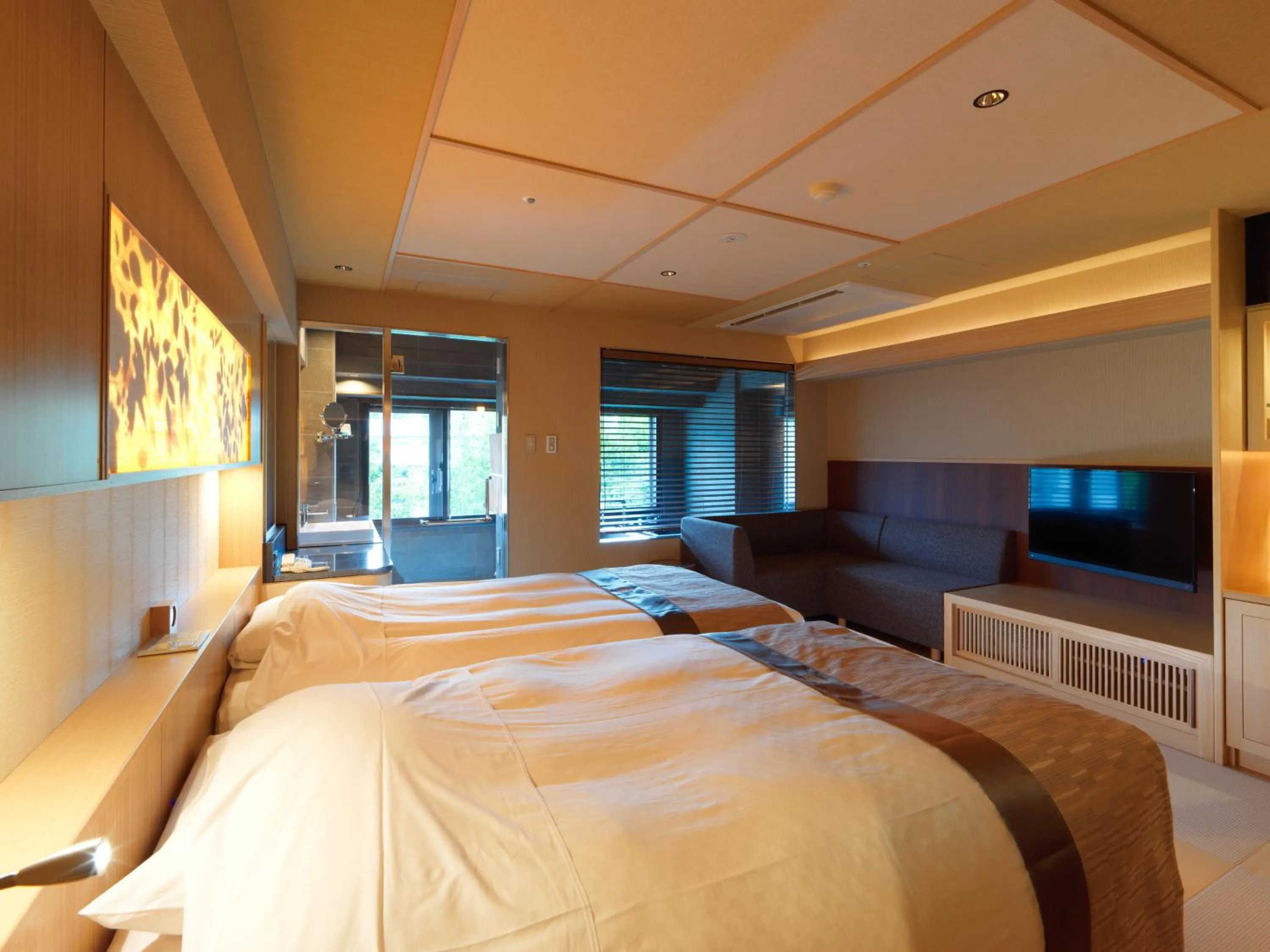 Photo of the whole room, Bed in Akan Yuku no Sato Tsuruga